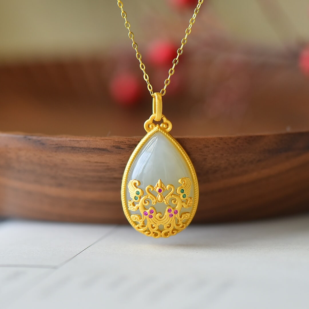 An Exquisite Sterling Silver-Gold Plated Inlaid White Jade Pendant,Inlaid Diamond: An Exquisite Sterling Silver-Gold Plated Inlaid White Jade Pendant,Inlaid Diamond,Size:15mmx23mm 纯银镀金镶白玉吊坠,嵌钻石