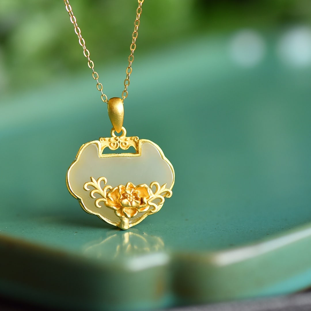 An Exquisite Sterling Silver-Gold Plated Inlaid White Jade Pendant: An Exquisite Sterling Silver-Gold Plated Inlaid White Jade Pendant 纯银镀金镶白玉吊坠