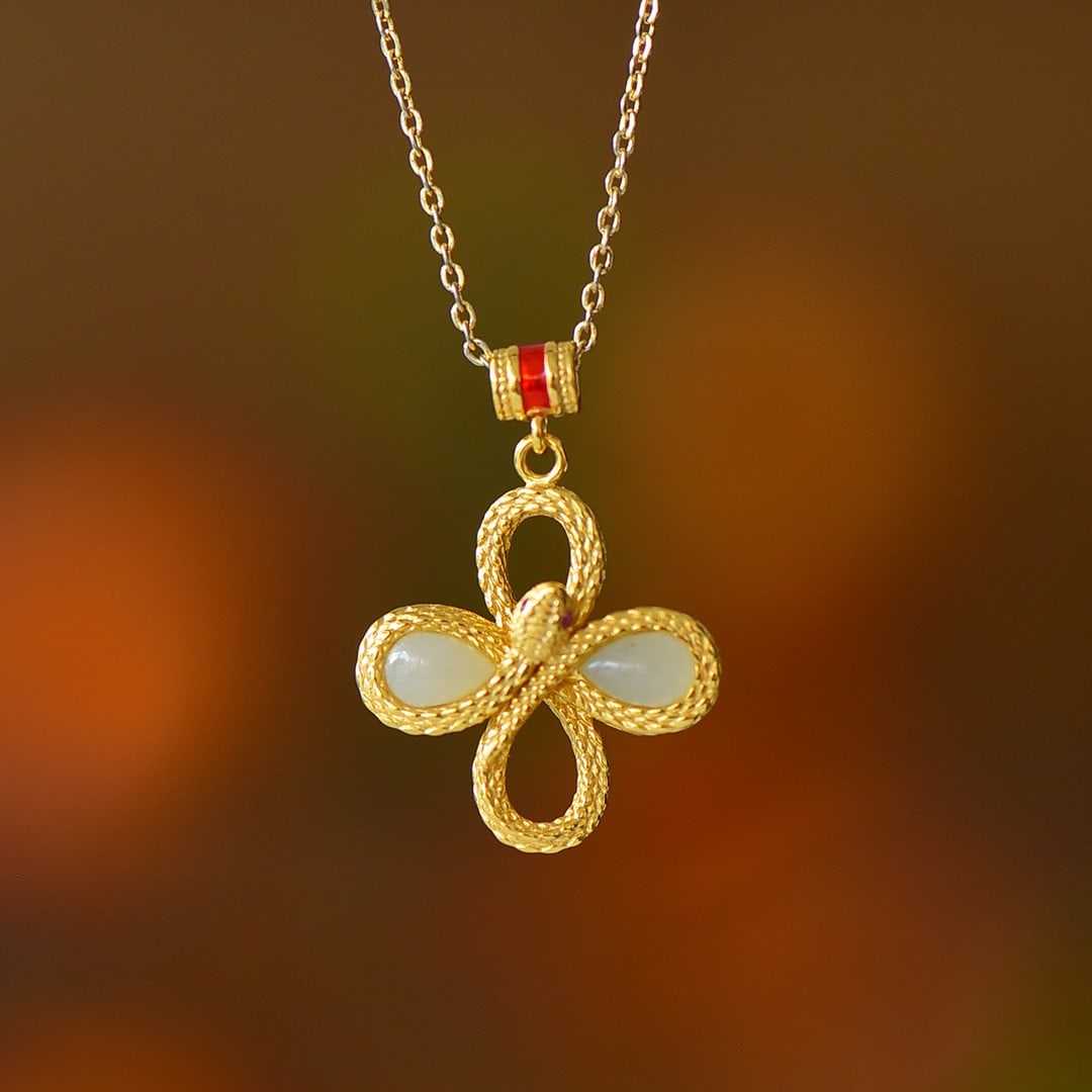 An Exquisite Sterling Silver-Gold Plated Inlaid White Jade Pendant: An Exquisite Sterling Silver-Gold Plated Inlaid White Jade Pendant,Size:4mmx6mm 纯银镀金镶白玉吊坠