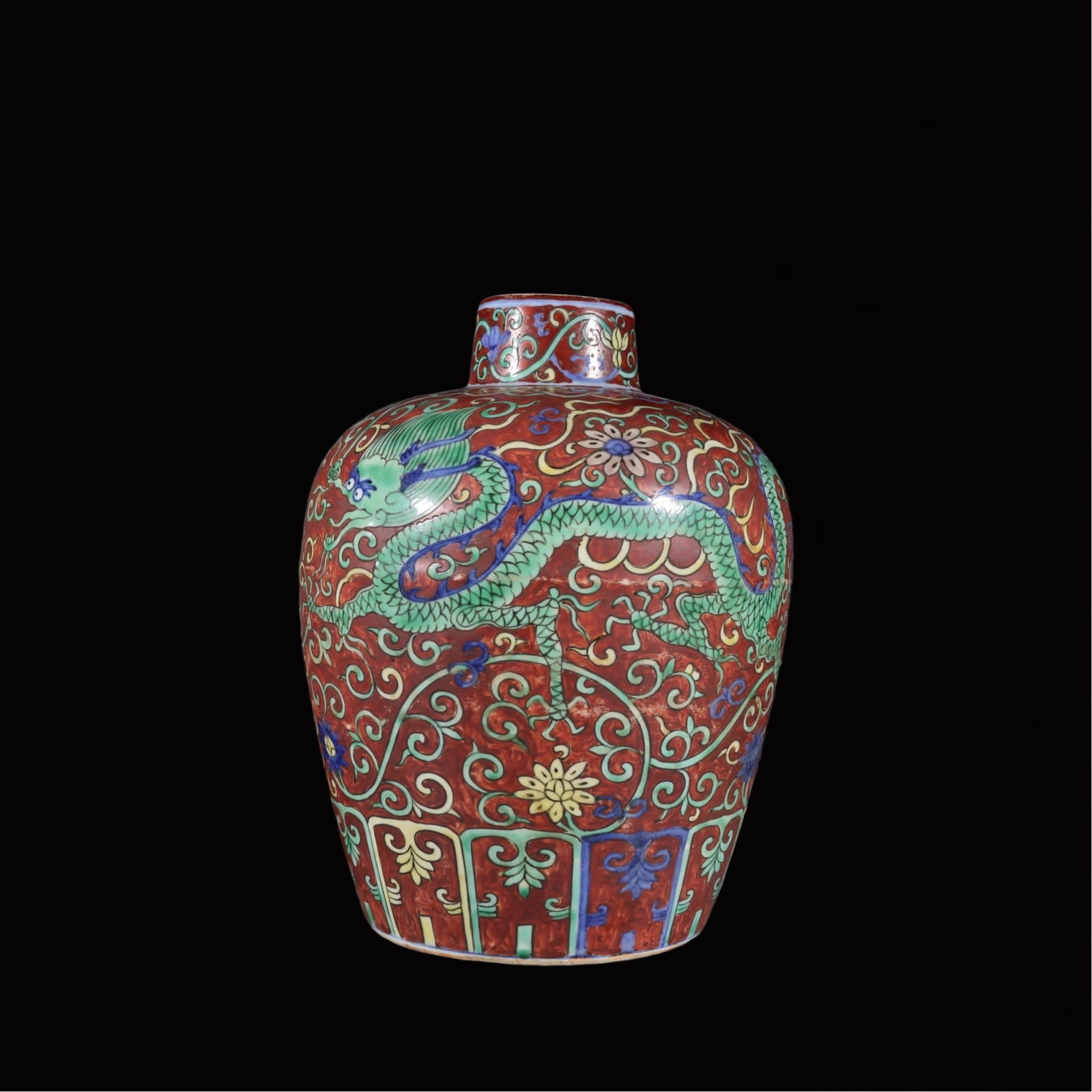 An Exquisite Blue and White Red Ground Flower and Dragon Pattern Vase: An Exquisite Blue and White Red Ground Flower and Dragon Pattern Vase,Ming Dynasty,China,Jiajing Six-Character Mark,Size:8.7inx6.7in 