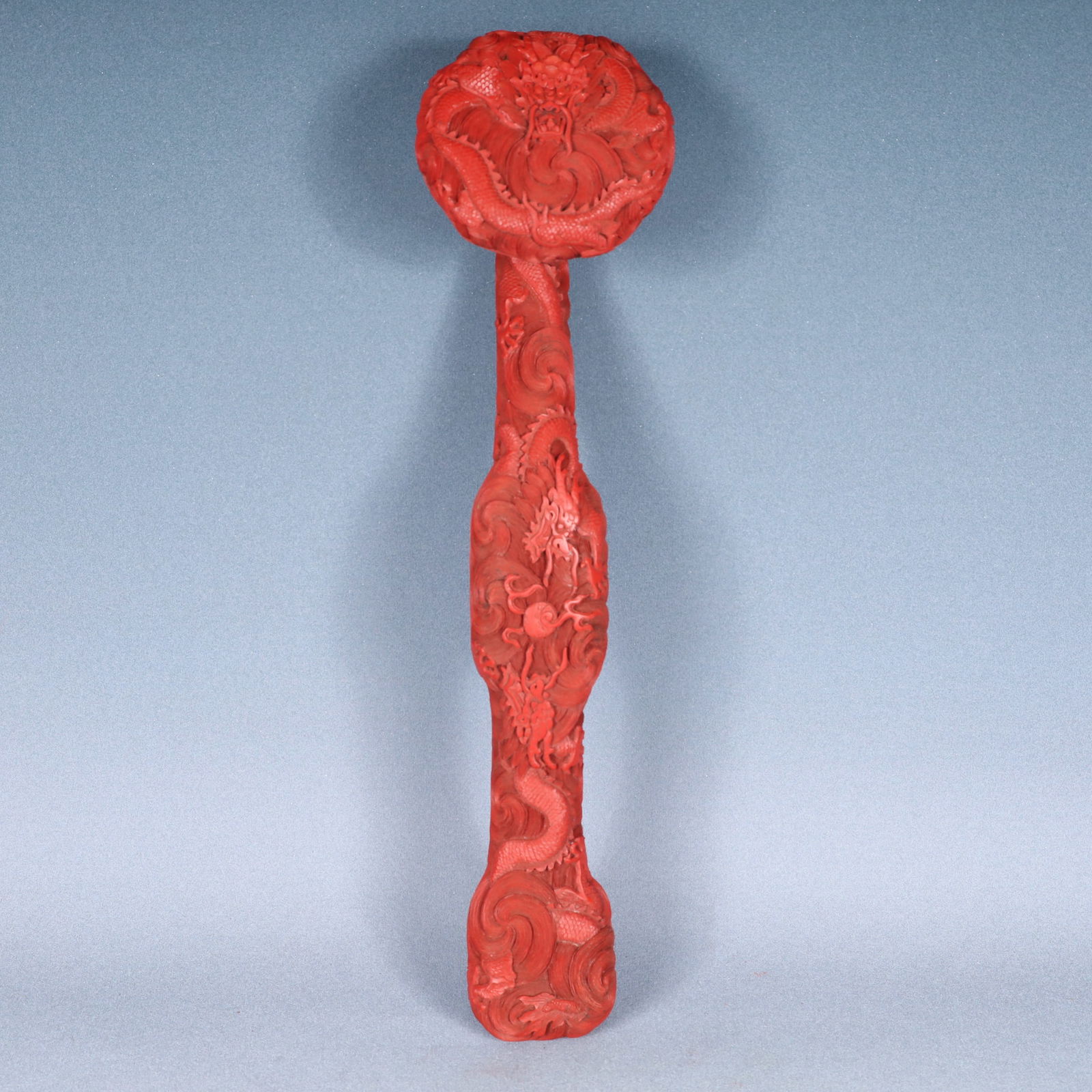 A Huge Carved Red Lacquer Dragon Pattern Ruyi: A Huge Carved Red Lacquer Dragon Pattern Ruyi,Qing Dynasty, China,Size:16.9inx4.3inx3.1in,Weight:400g 剔红漆龙纹如意,中国清代