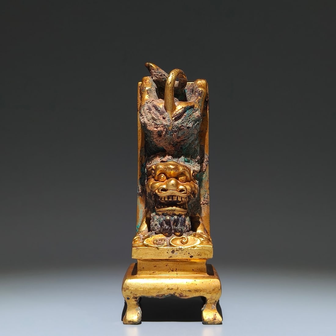 A Rare Gilt Bronze Lion-Shaped Ornament: A Rare Gilt Bronze Lion-Shaped Ornament,Qing Dynasty, China,Size:8.1inx3.3inx3.1in 铜鎏金狮形摆件,中国清代