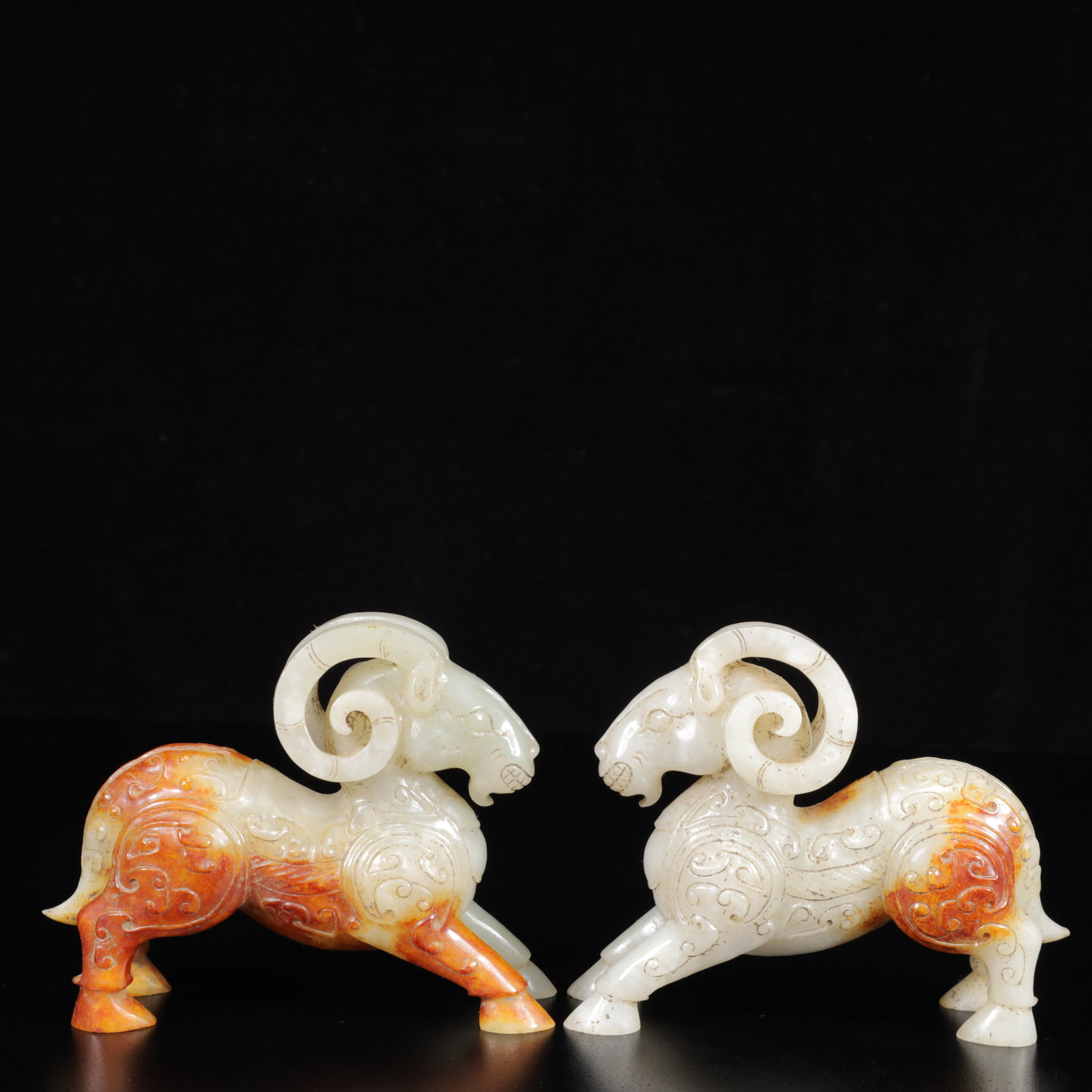A Pair of Exquisite White Jade Sheep Ornaments: A Pair of Exquisite White Jade Sheep Ornaments,Qing Dynasty,China,Size:3.9inx1.2inx3.1in,Weight:600g 一对白玉羊摆件,中国清代