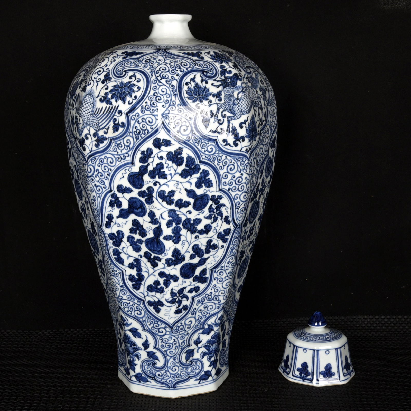 A Huge Blue and White Lotus and Phoenix Pattern Bottle: A Huge Blue and White Lotus and Phoenix Pattern Bottle,Yuan Dynasty,China,Size:19.7inx10.6in 青花缠枝莲凤纹盖瓶,中国元代