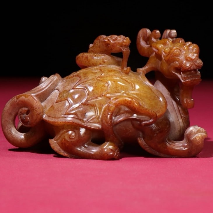 An Exquisite White Jade Auspicious Beast Ornament (1 of 9)