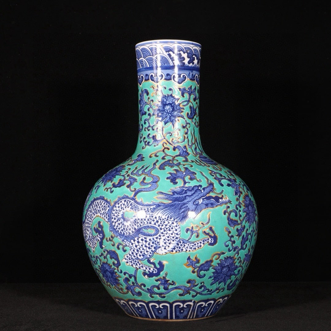 An Exquisite Green Ground Blue and White Lotus and Dragon Pattern Vase (1 of 9)