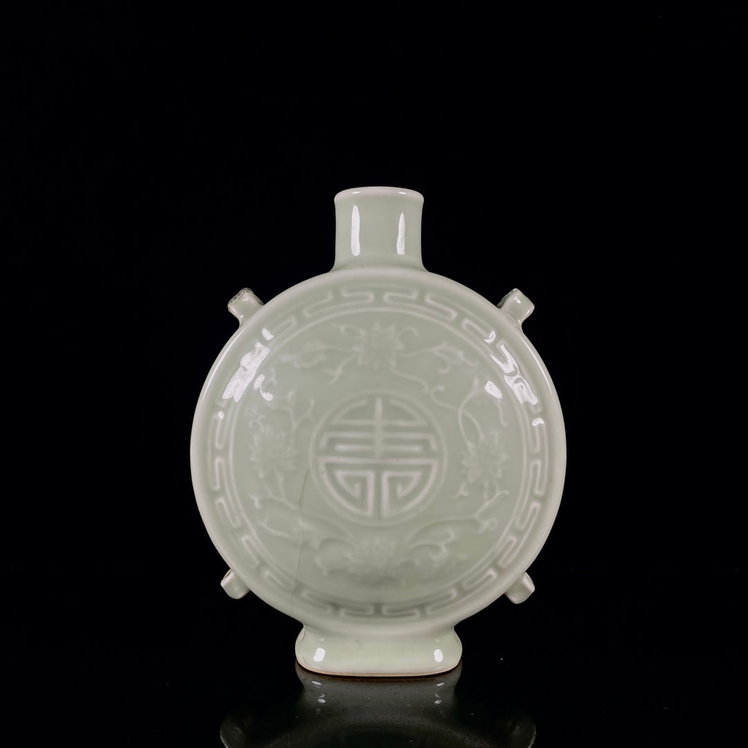An Exquisite Celadon Glazed Lotus Pattern Vase (1 of 9)