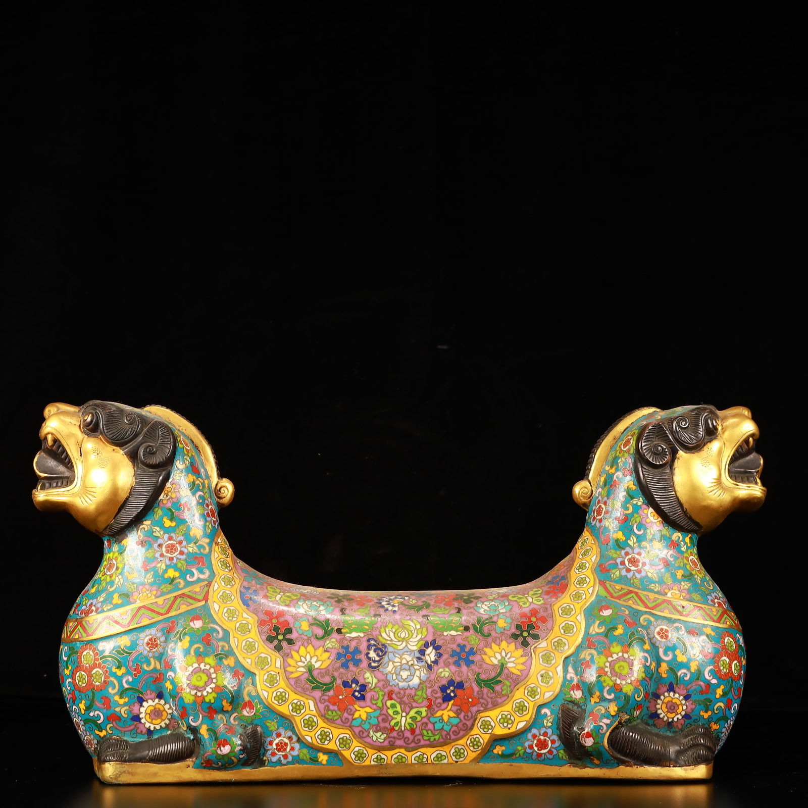 A Huge Cloisonne Flower Pattern Lion-Shaped Pillow: A Huge Cloisonne Flower Pattern Lion-Shaped Pillow,(A type of enamelware with metal wires separating colored glaze, originating in China),Qing Dynasty,China,Qianlong Four-character Mark,Size:16.9inx5.