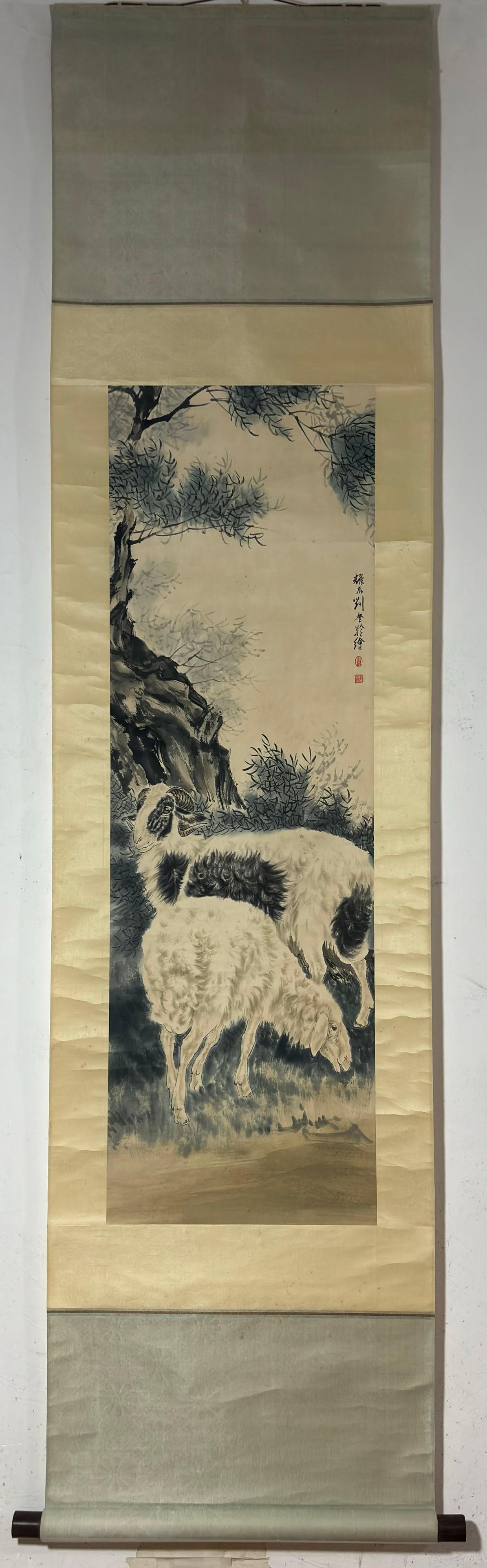 A Chinese Vertical Scroll Ink Painting of Sheep on Paper: A Chinese Vertical Scroll Ink Painting of Sheep on Paper,Liu Kuiling,Size:41.1inx13.2in 一幅中国水墨羊画立轴,刘奎龄