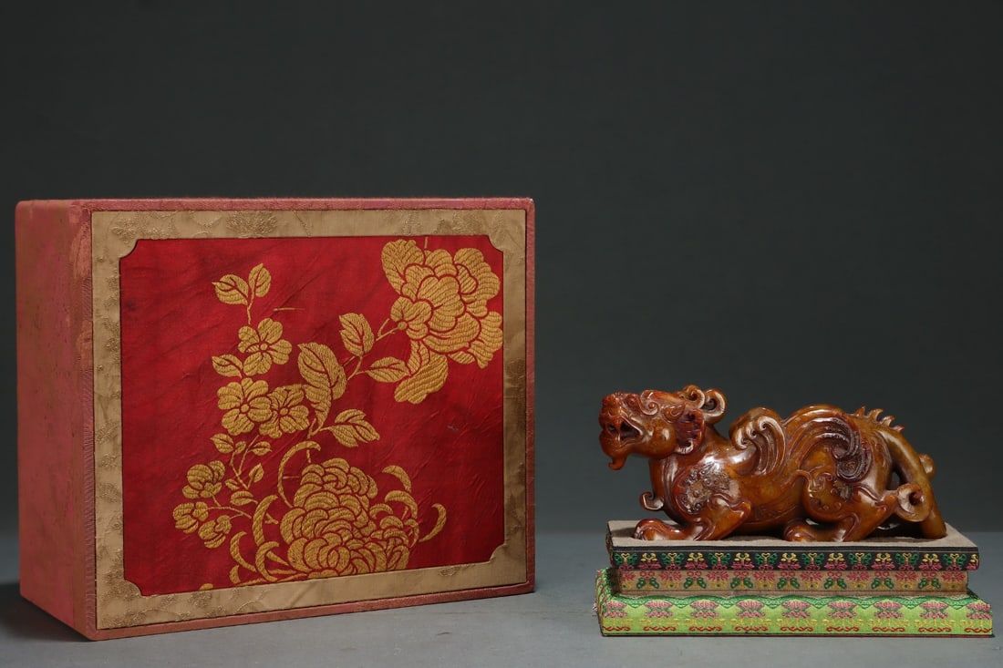 An Exquisite Archaic Jade Auspicious Beast Ornament (1 of 8)