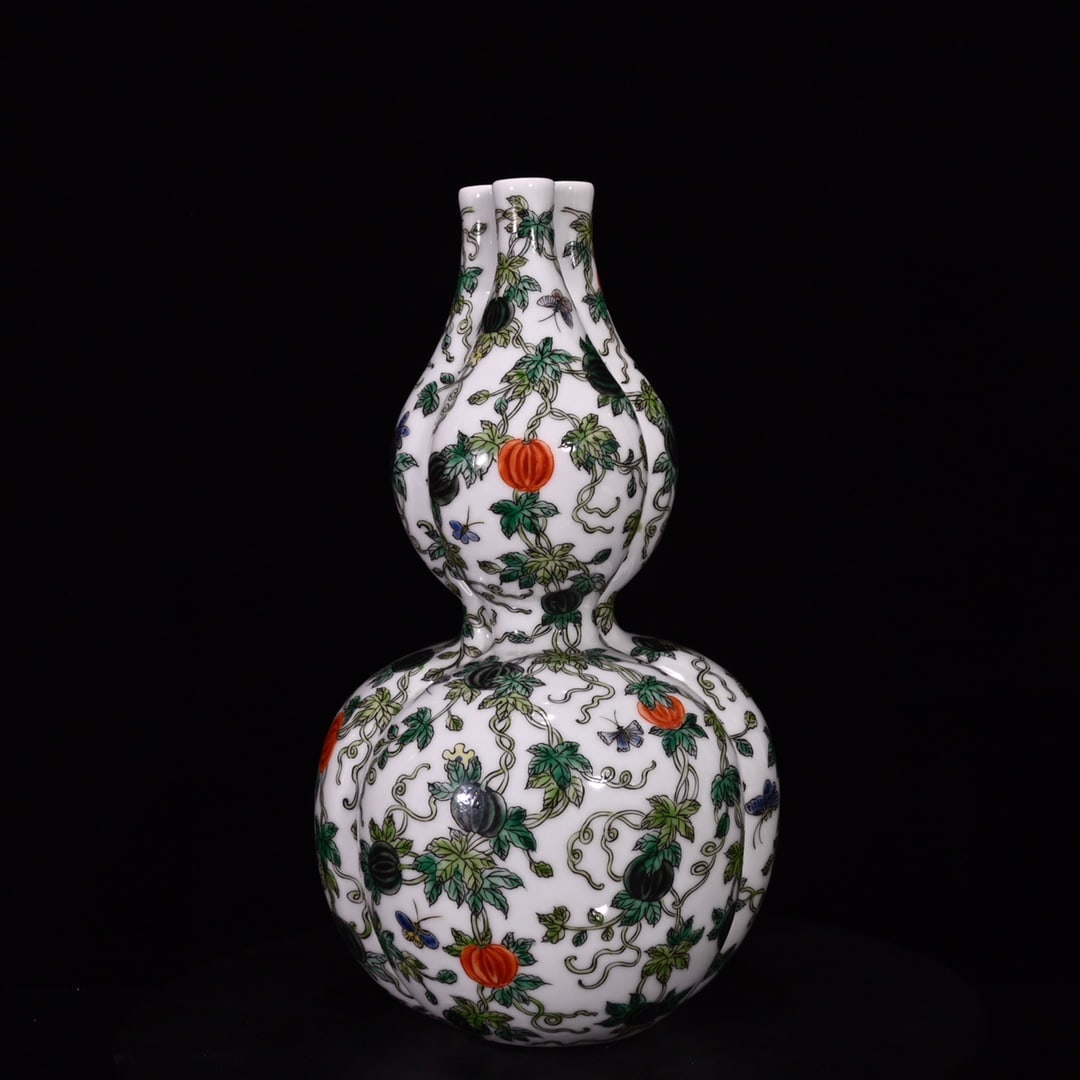 An Exquisite Wucai Melon and Fruit Pattern Gourd-Shaped Vase (1 of 9)