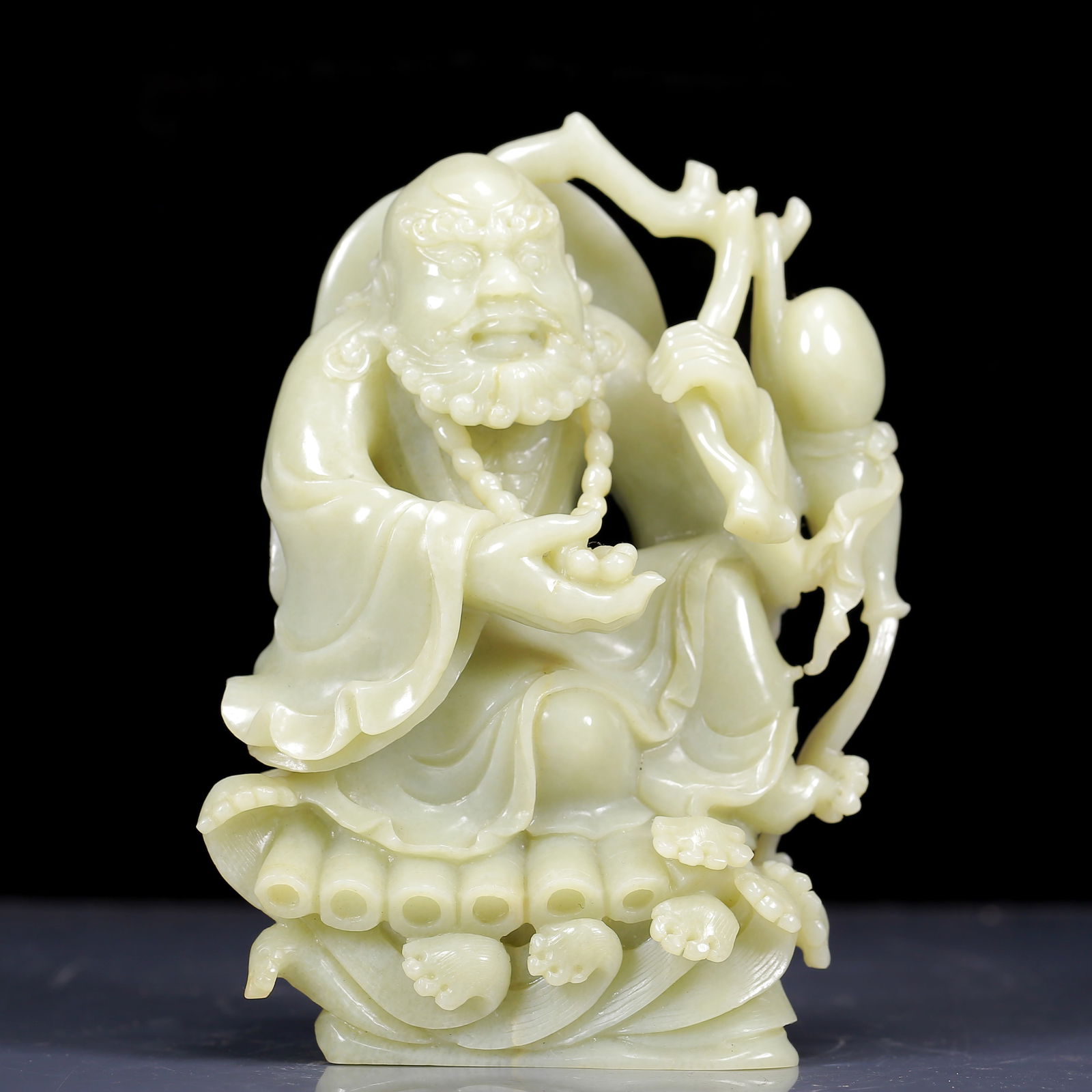An Exquisite White Jade Dharma Ornament: An Exquisite White Jade Dharma Ornament,Qing Dynasty, China,Size: 5.1inx2.8inx3.5in,Weight:2015g 白玉达摩像摆件，清代