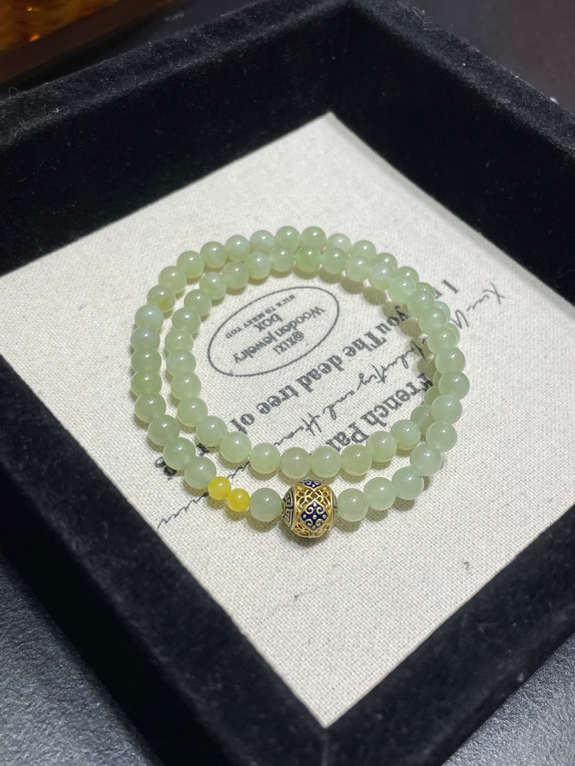 An Exquisite Greenish Jade Bracelet (1 of 1)