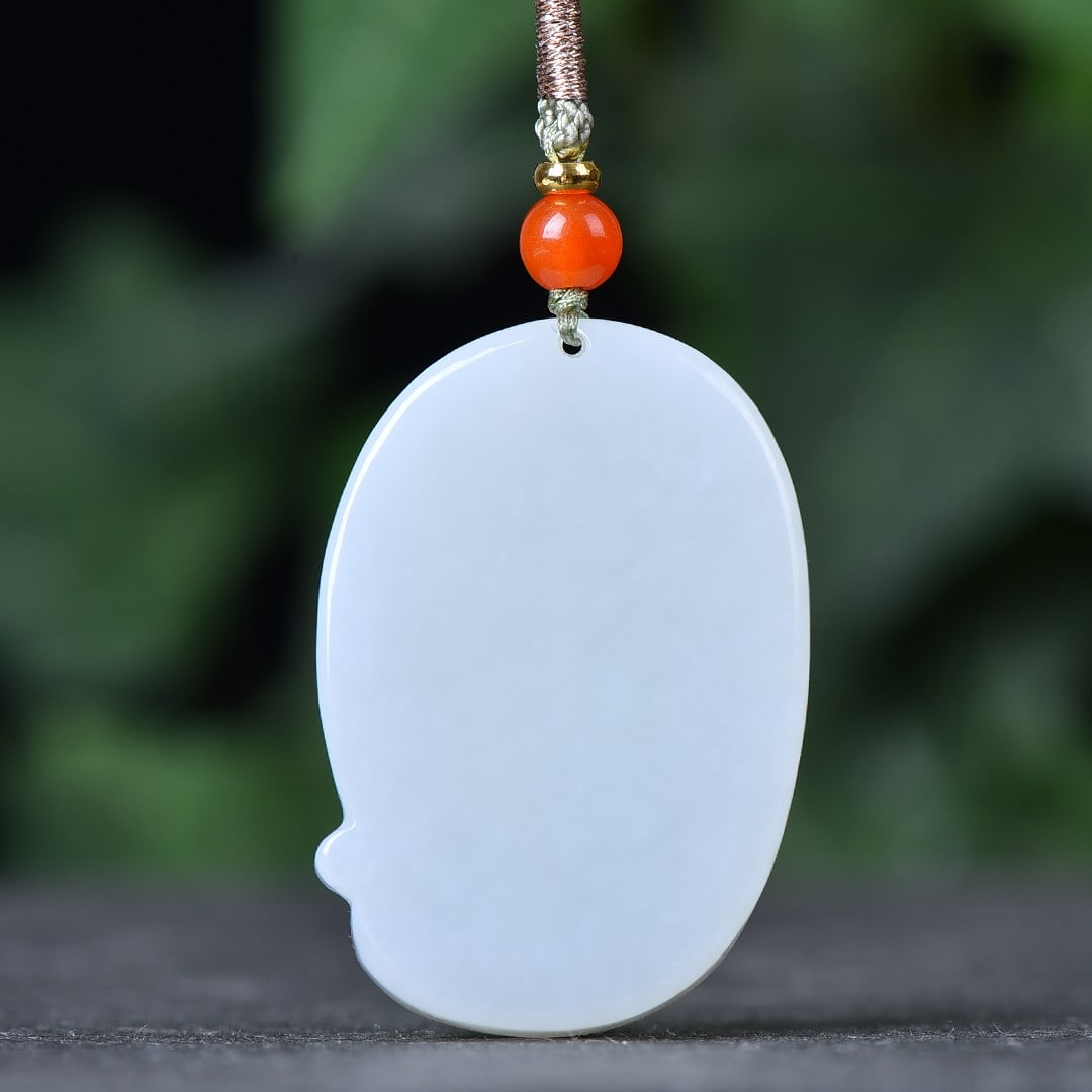 An Exquisite White Jade Statue of Avalokitesvara Pendant: An Exquisite White Jade Statue of Avalokitesvara Pendant,Size:1.1inx1.7in 白玉观音像挂件