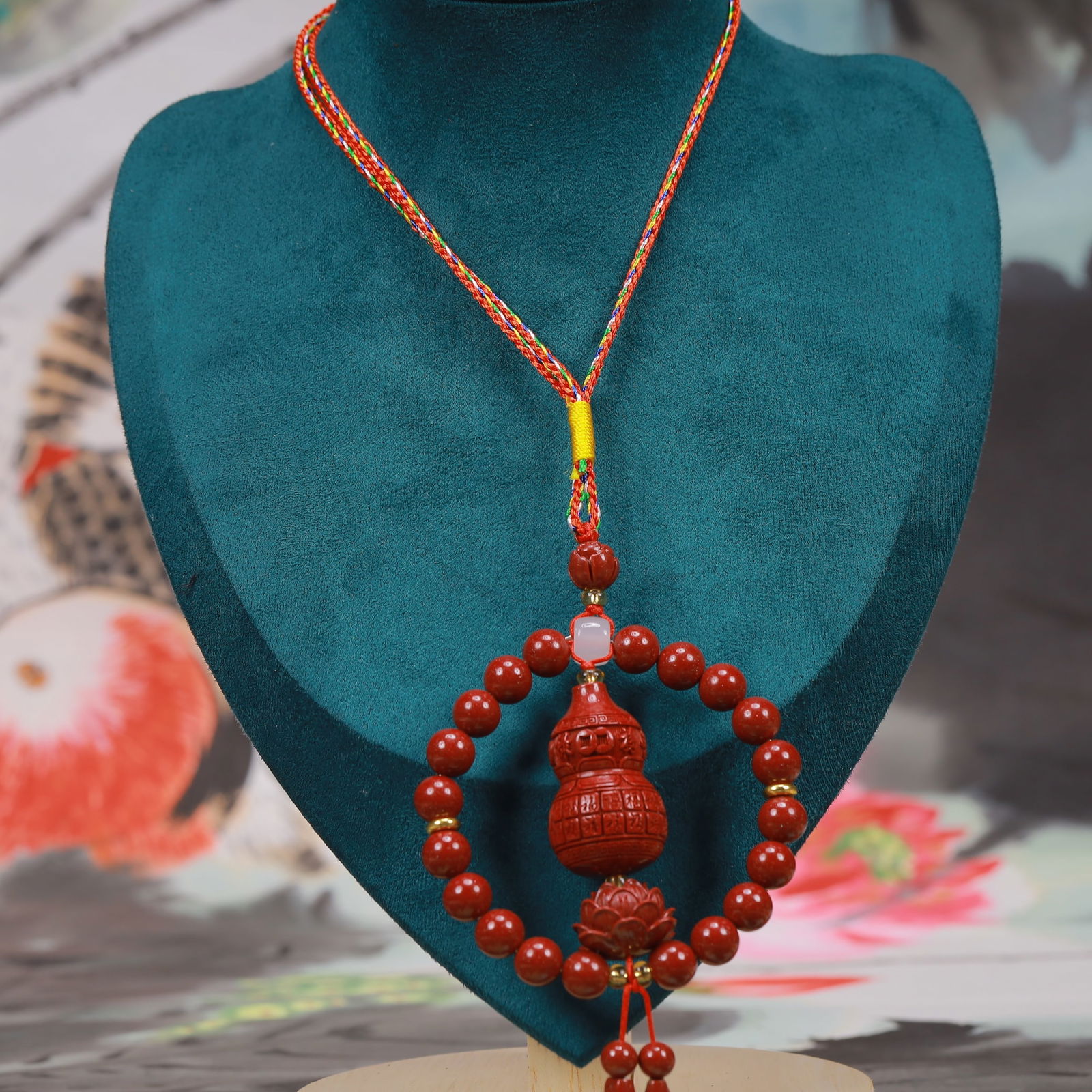 An Exquisite Cinnabar Gourd-Shaped Pendant: An Exquisite Cinnabar Gourd-Shaped Pendant, Size:2.4inx4.3in, Weight:56g 朱砂葫芦形挂件