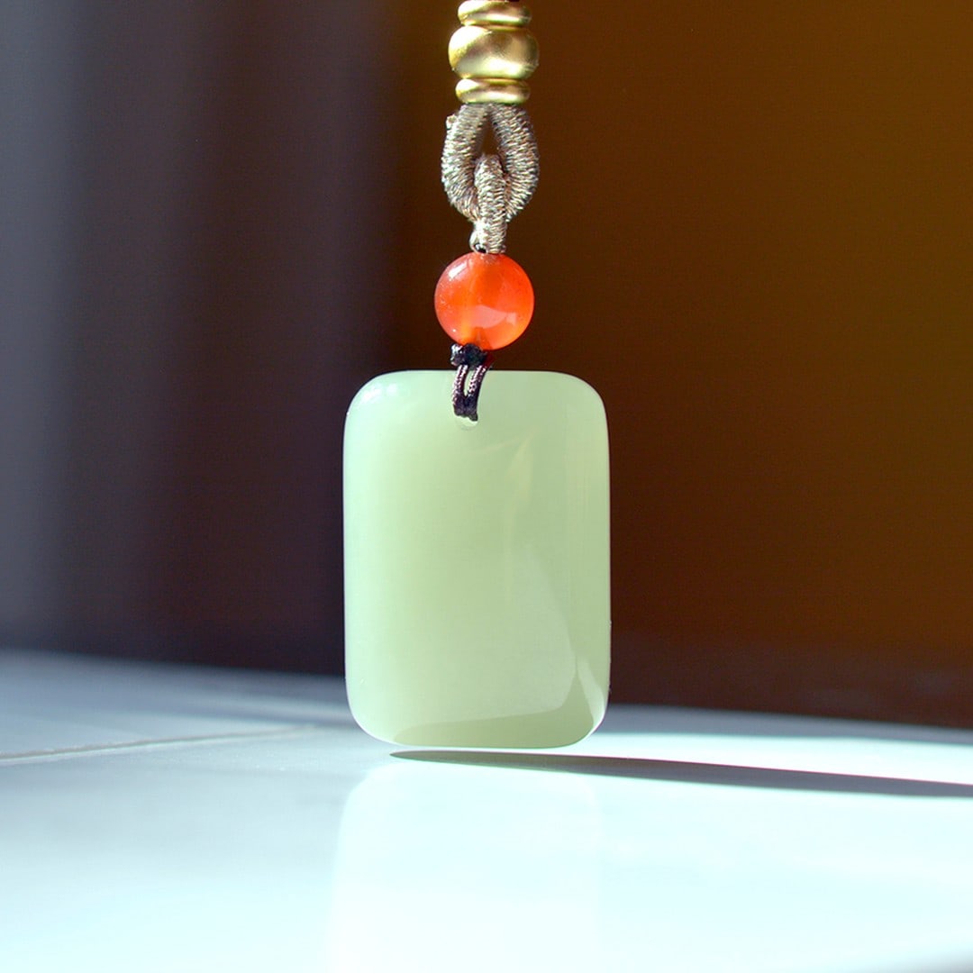 An Exquisite Greenish Jade Pendant (1 of 4)