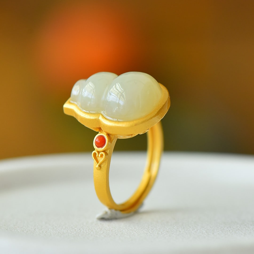 An Exquisite Sterling Silver-Gold Plated Inlaid White Jade Ring: An Exquisite Sterling Silver-Gold Plated Inlaid White Jade Ring 纯银镀金镶白玉戒指