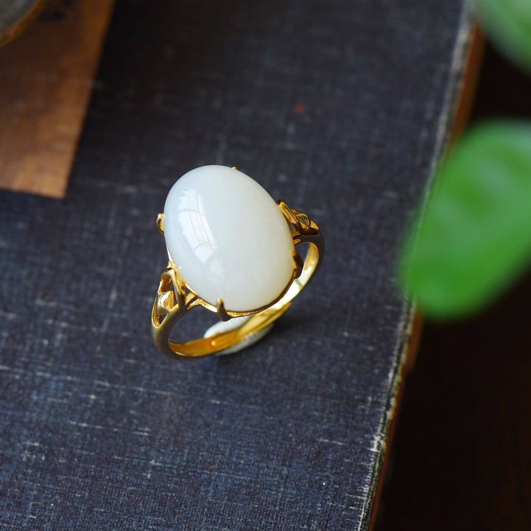 A Pair of Exquisite Sterling Silver-Gold Plated Inlaid White Jade Ring: A Pair of Exquisite Sterling Silver-Gold Plated Inlaid White Jade Ring,Size:0.5inx0.6in 纯银镀金镶白玉戒指