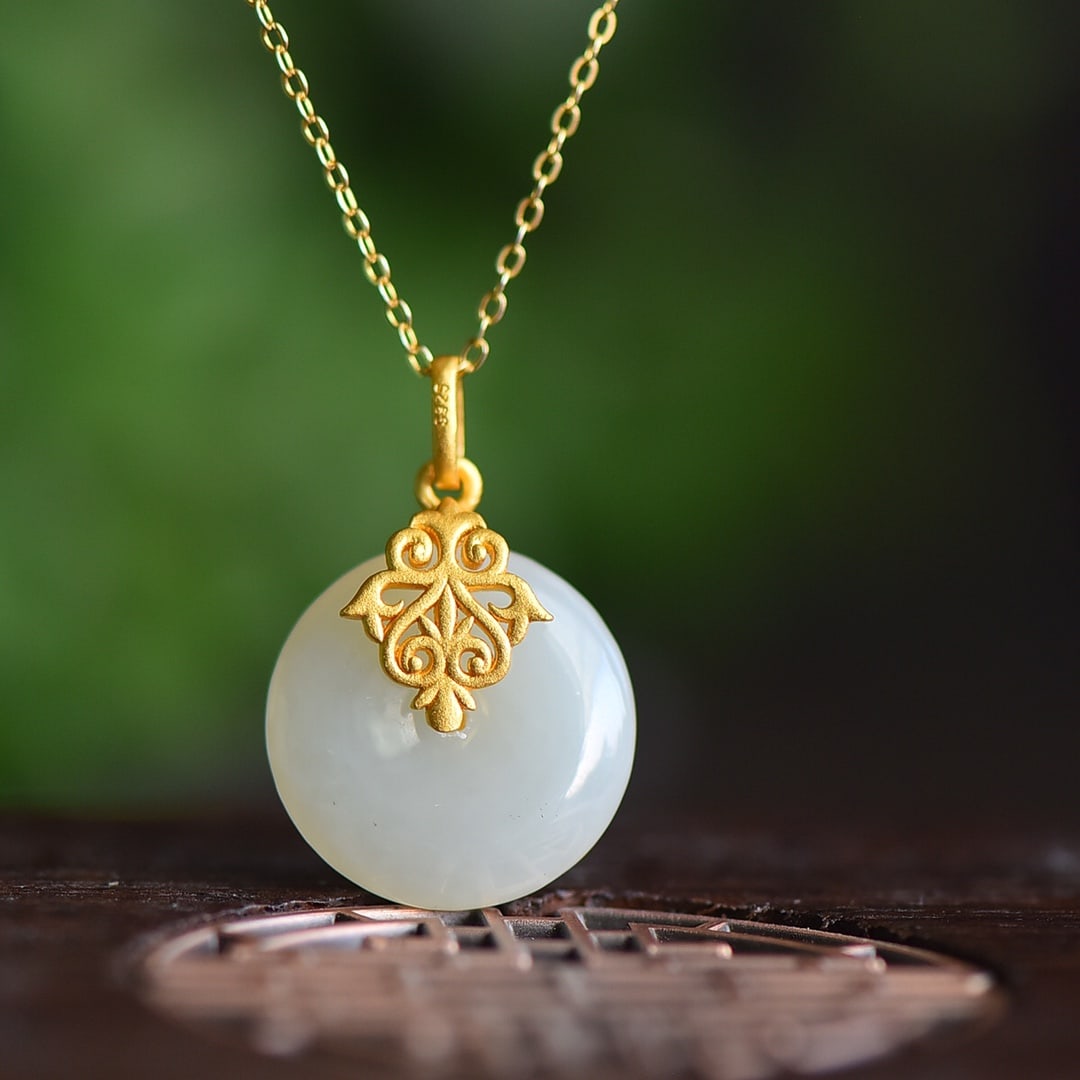An Exquisite Sterling Silver-Gold Plated Inlaid White Jade Pendant: An Exquisite Sterling Silver-Gold Plated Inlaid White Jade Pendant 纯银镀金镶白玉吊坠