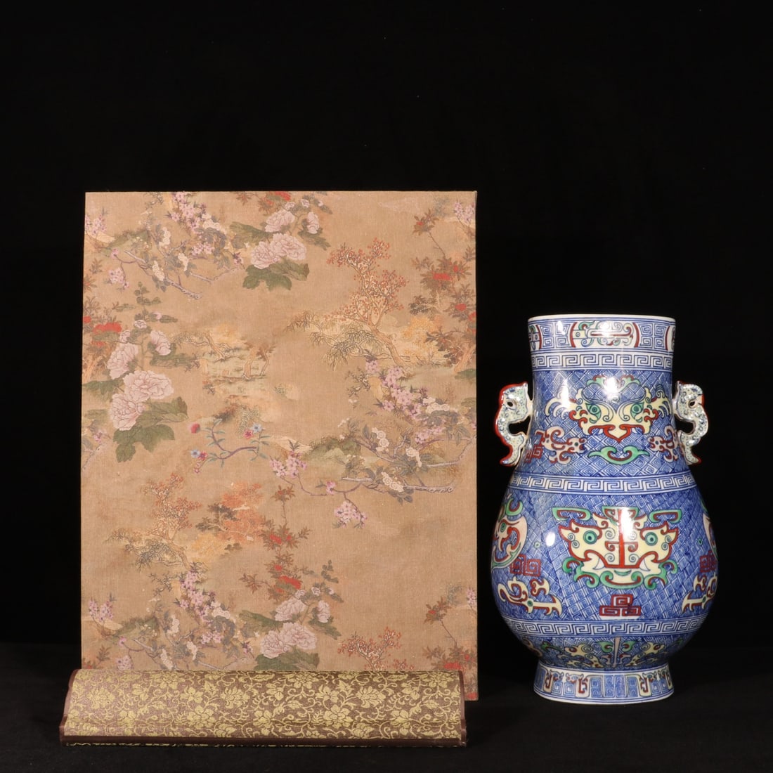 A Rare Blue and White Doucai Beast-Face Pattern Double-Ears Vase,With Vertical Scroll Painting on: A Rare Blue and White Doucai Beast-Face Pattern Double-Ears Vase,With Vertical Scroll Painting on Silk,Qing Dynasty, China,Qianlong Six-character Mark,Size:13.2inx7.7in 青花斗彩