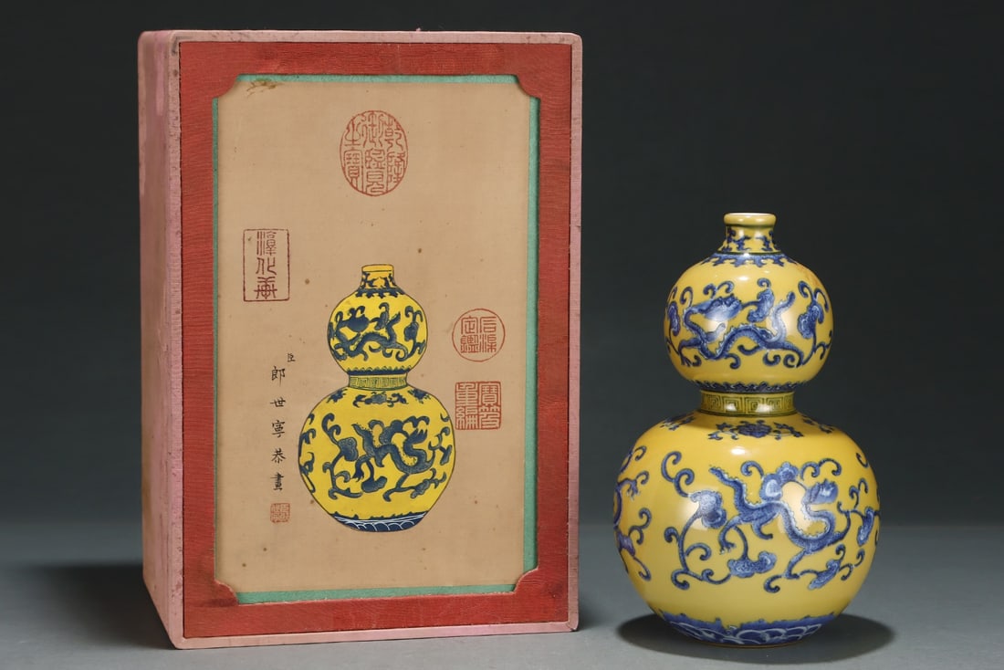 An Exquisite Yellow Ground Blue and White Seawater and Dragon Pattern Gourd-Shaped Vase: An Exquisite Yellow Ground Blue and White Seawater and Dragon Pattern Gourd-Shaped Vase,Qing Dynasty, China,Qianlong Six-character Mark,Size:8.5inx5.4in 黄地青花海水