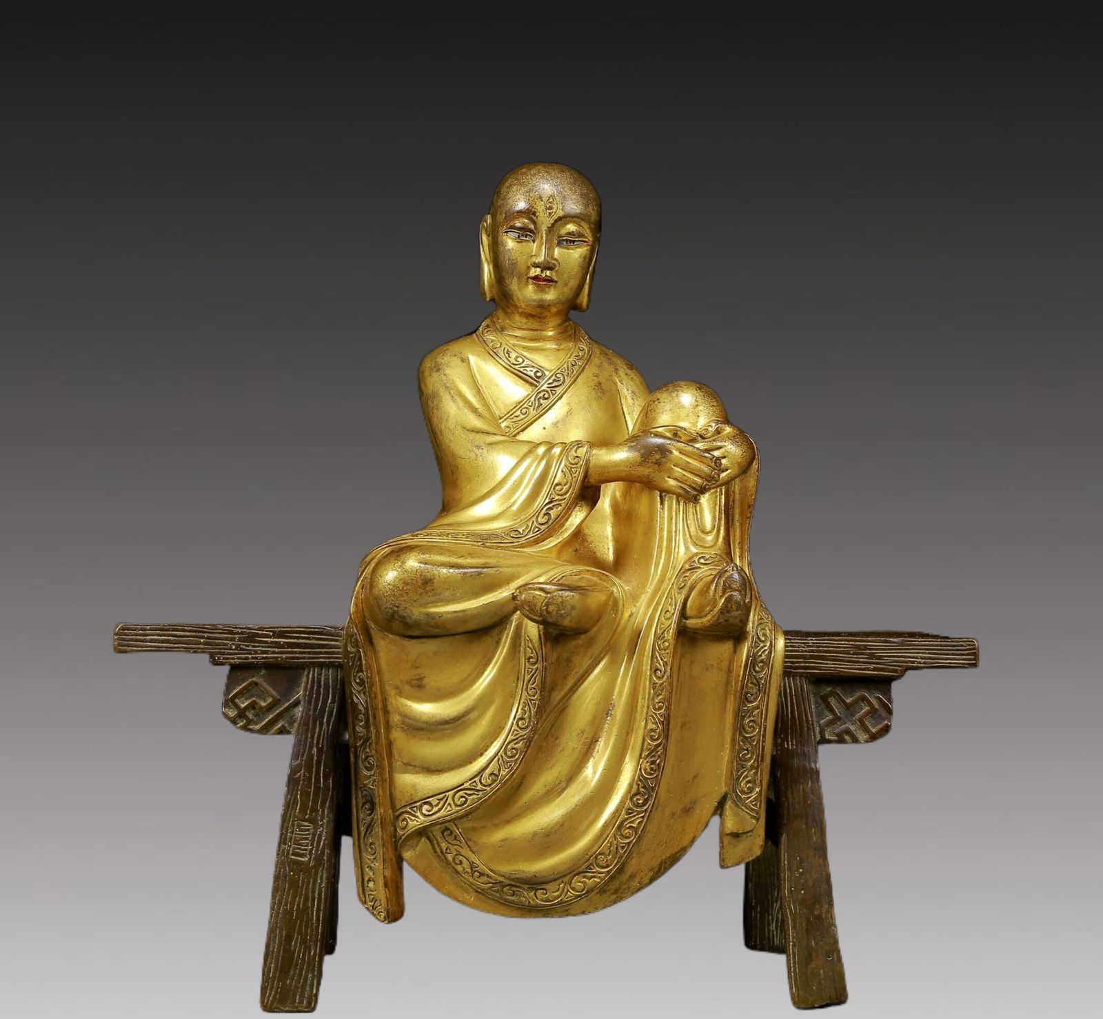 A Solemn Gilt Bronze Statue of Arhat: A Solemn Gilt Bronze Statue of Arhat,Ming Dynasty, China,Size:11.4inx3.1inx11.4in,Weight:4230g 铜鎏金罗汉像，明代