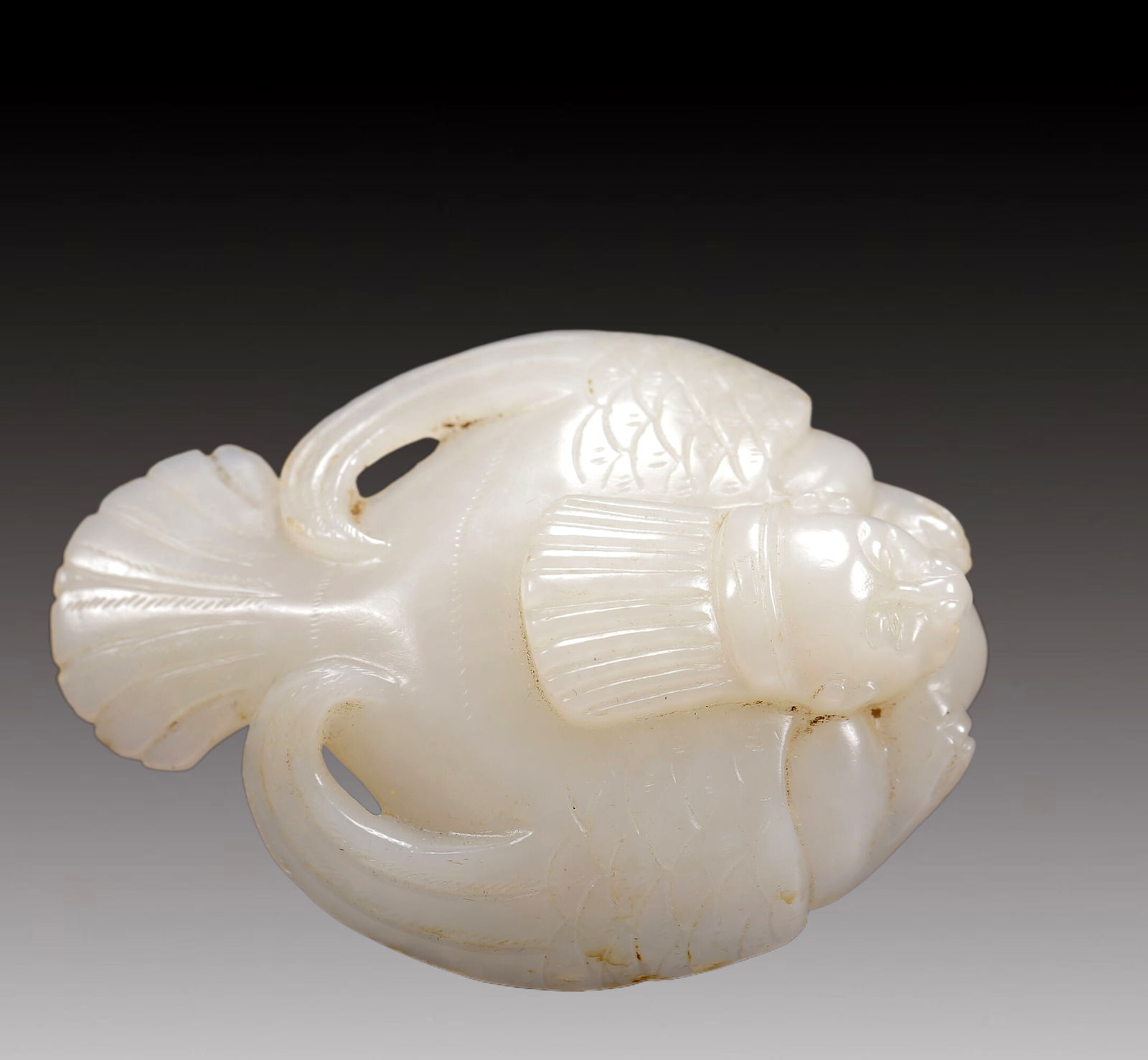 An Exquisite White Jade Auspicious Beast Ornament (1 of 4)