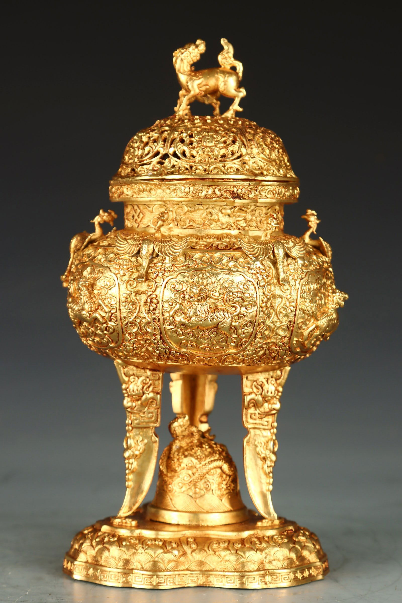 An Exquisite Gilt Bronze Auspicious Cloud and Kylin Pattern Tripod Censer: An Exquisite Gilt Bronze Auspicious Cloud and Kylin Pattern Tripod Censer,Qing Dynasty,China,Qianlong Four-character Mark,Size:9.1inx1.2inx5.1in,Weight:1277g 铜鎏金祥云&#