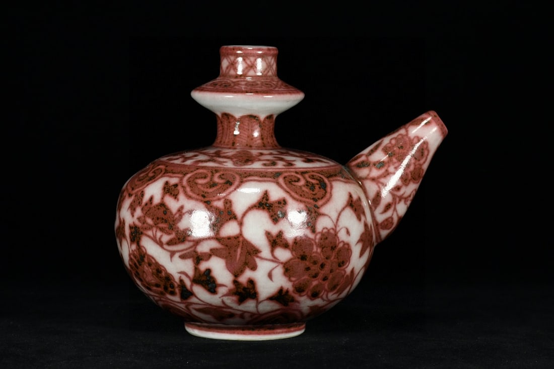 An Exquisite Underglaze-Red Lotus Pattern Ewer: An Exquisite Underglaze-Red Lotus Pattern Ewer,Ming Dynasty, China,Size:7.1inx7.9in 釉里红缠枝莲纹执壶,中国明代