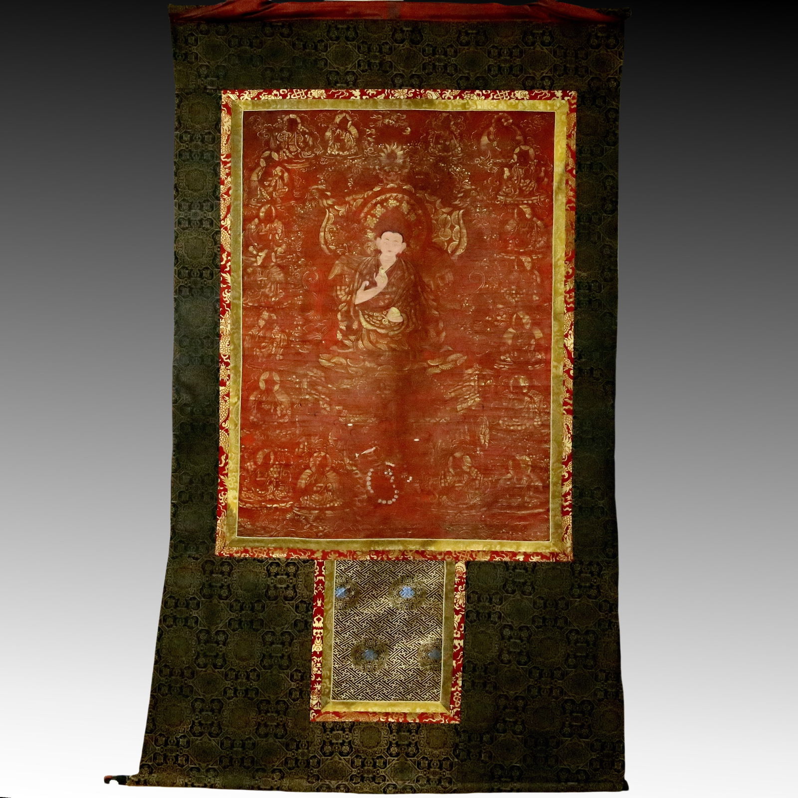An Exquisite Brocade Painted Color Statue of Guru Tangka: An Exquisite Brocade Painted Color Statue of Guru Tangka,Qing Dynasty, China,Size:52.8inx92.1in 织锦彩绘上师像唐卡，清代