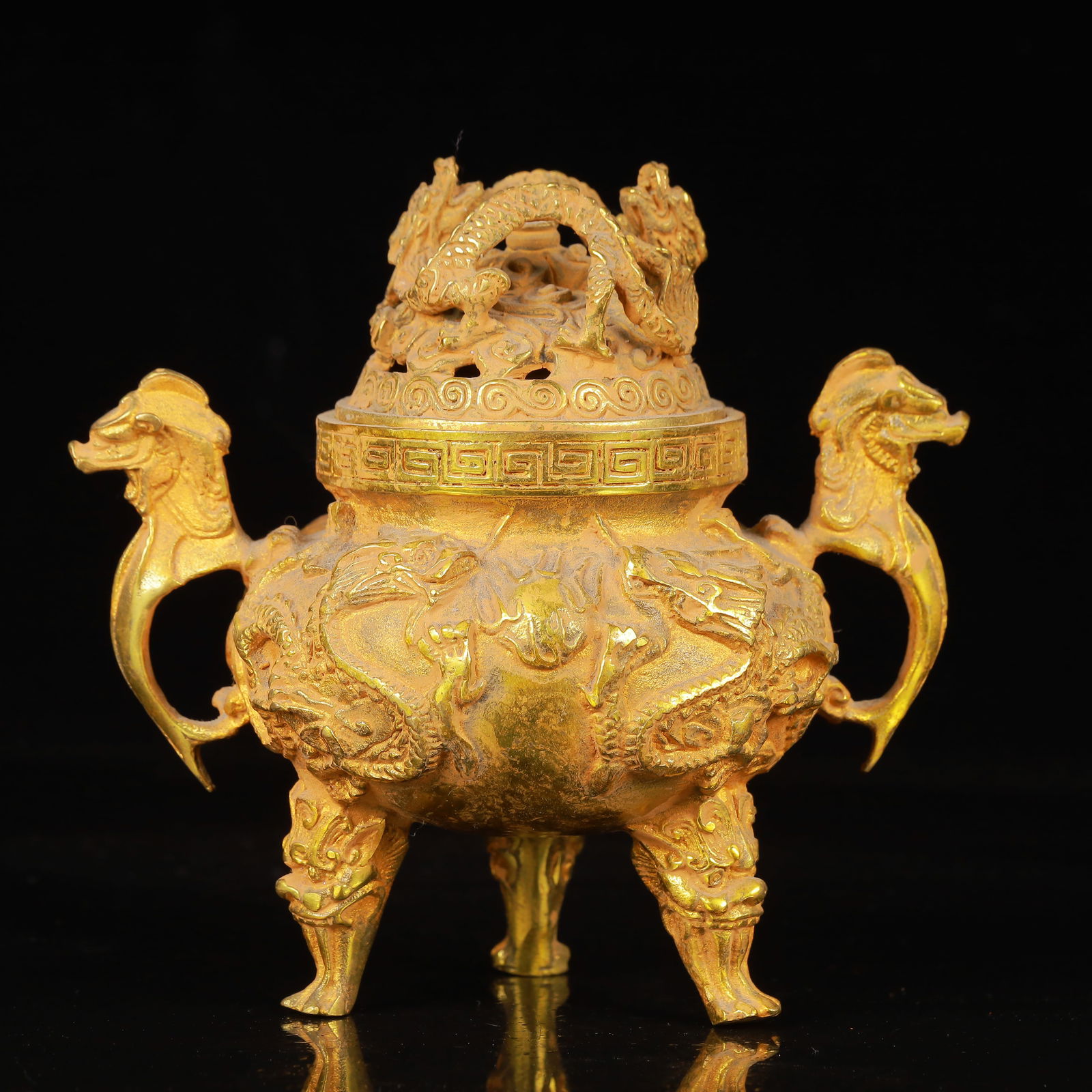 An Exquisite Gilt Bronze Dragon Pattern Beast-Ears Tripod Censer: An Exquisite Gilt Bronze Dragon Pattern Beast-Ears Tripod Censer,Ming Dynasty,China,Xuande Four-Character Mark,Size:5.9inx5.5in,Weight:680g 铜鎏金龙纹兽耳