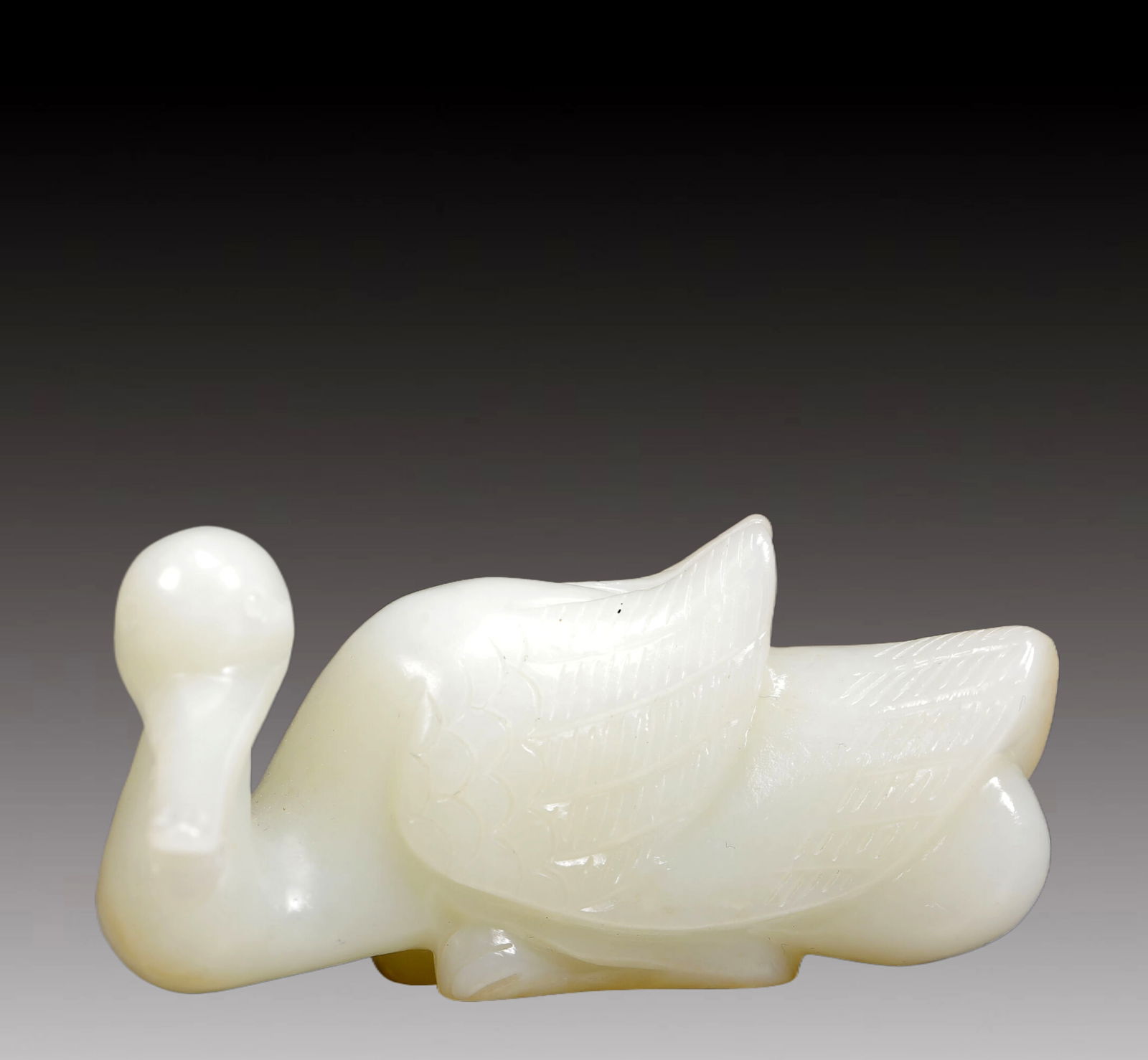 An Exquisite White Jade Duck Ornament: An Exquisite White Jade Duck Ornament,Qing Dynasty, China,Size:2.8inx1inx1.4in,Weight:105g 白玉鸭摆件，清代