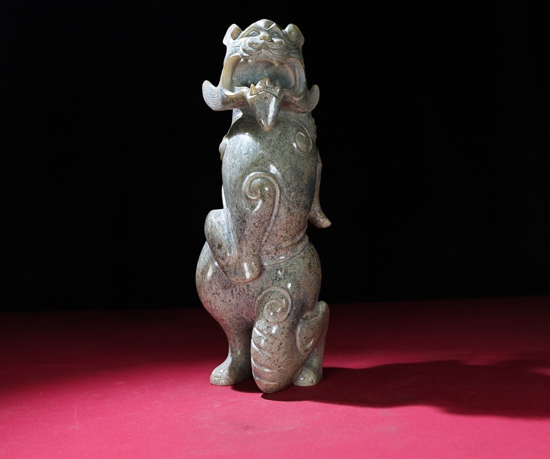 An Exquisite Archaic Jade Auspicious Beast Ornament (1 of 9)