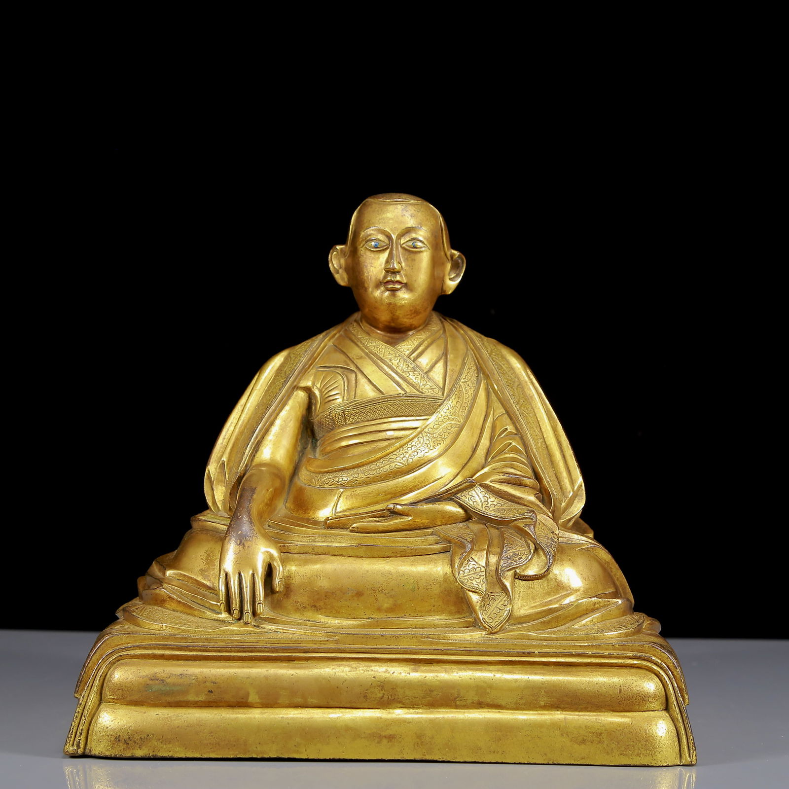 A Solemn Gilt Bronze Statue of Guru: A Solemn Gilt Bronze Statue of Guru,Ming Dynasty, China,Size:8.7inx8.3inx10.2in,Weight:5150g 铜鎏金上师像，明代