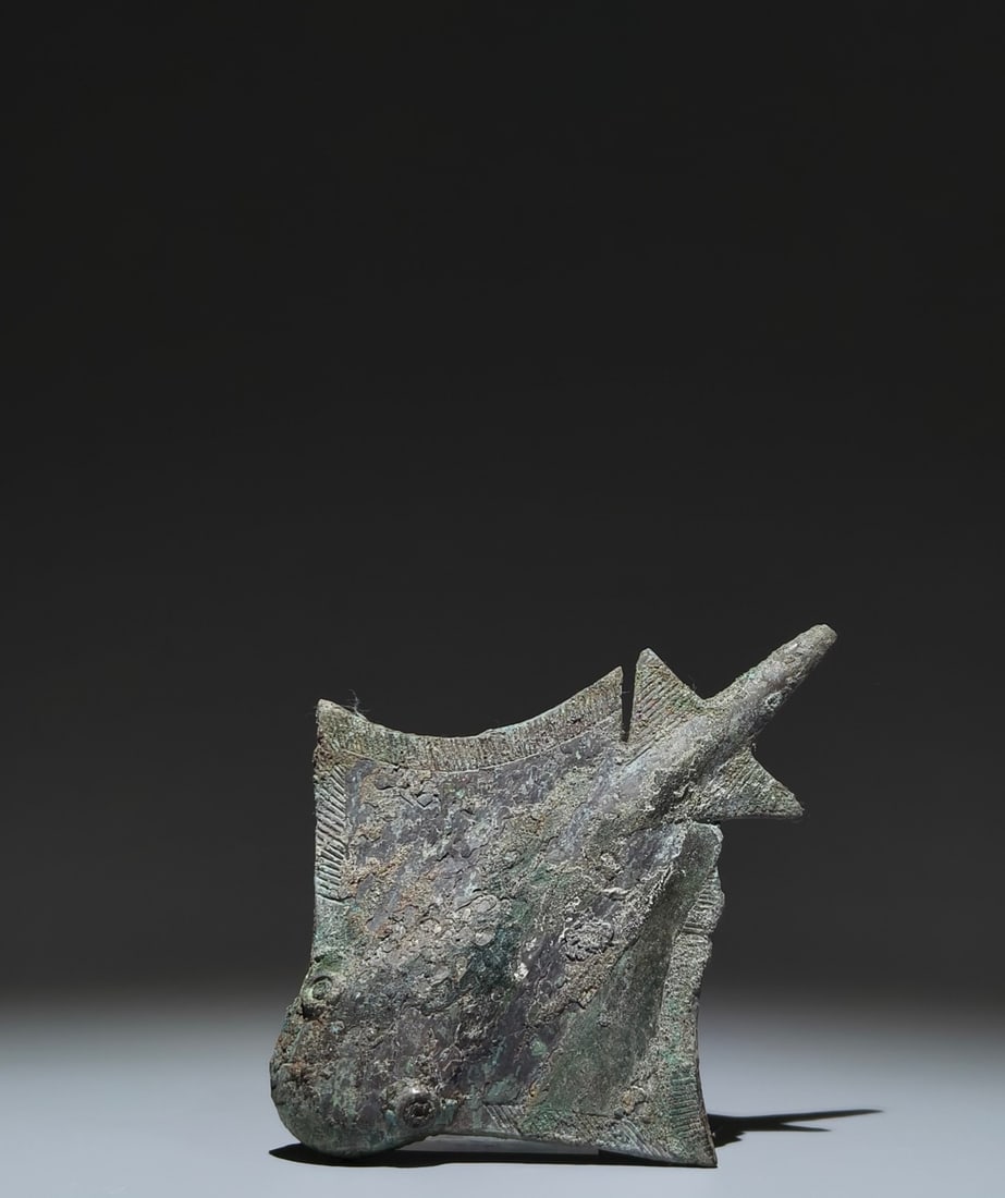 An Archaic Bronze Ray-Shaped Ornament (1 of 9)