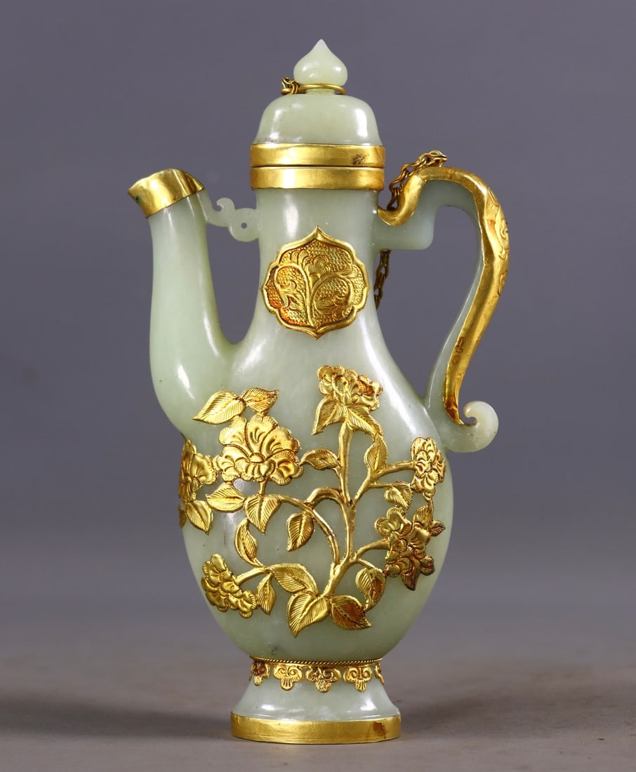 An Exquisite Greenish Jade Cover with Gold Flower Pattern Ewer: An Exquisite Greenish Jade Cover with Gold Flower Pattern Ewer,Qing Dynasty, China,Size:7.1inx3.5inx1.4in,Weight:328g 青白玉包金花卉纹执壶,&