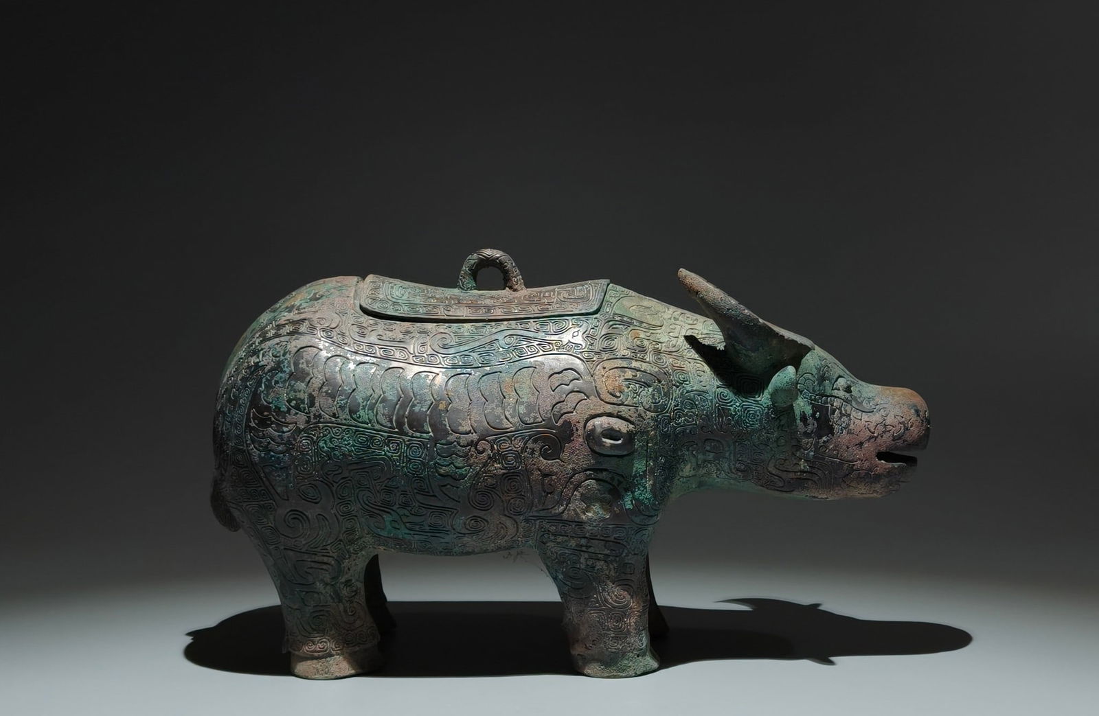 An Archaic Bronze Thunder and Cloud Pattern Buffalo-Shaped Food Vessel (1 of 9)