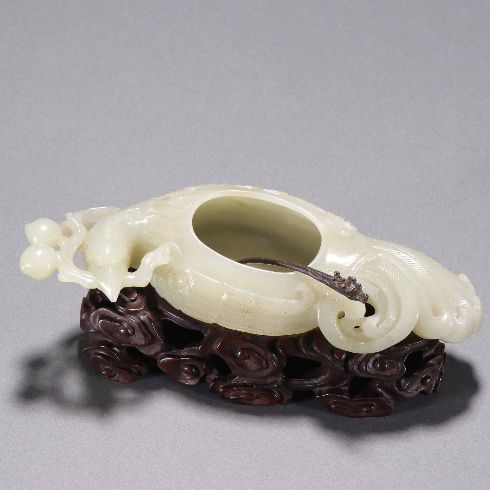 An Exquisite White Jade Phoenix Pattern Water Pot,With Zitanwood Base: An Exquisite White Jade Phoenix Pattern Water Pot,With Zitanwood Base,Qing Dynasty, China,Size:1.5inx7.1in,Weight:263g 白玉凤纹水盂,带紫檀木