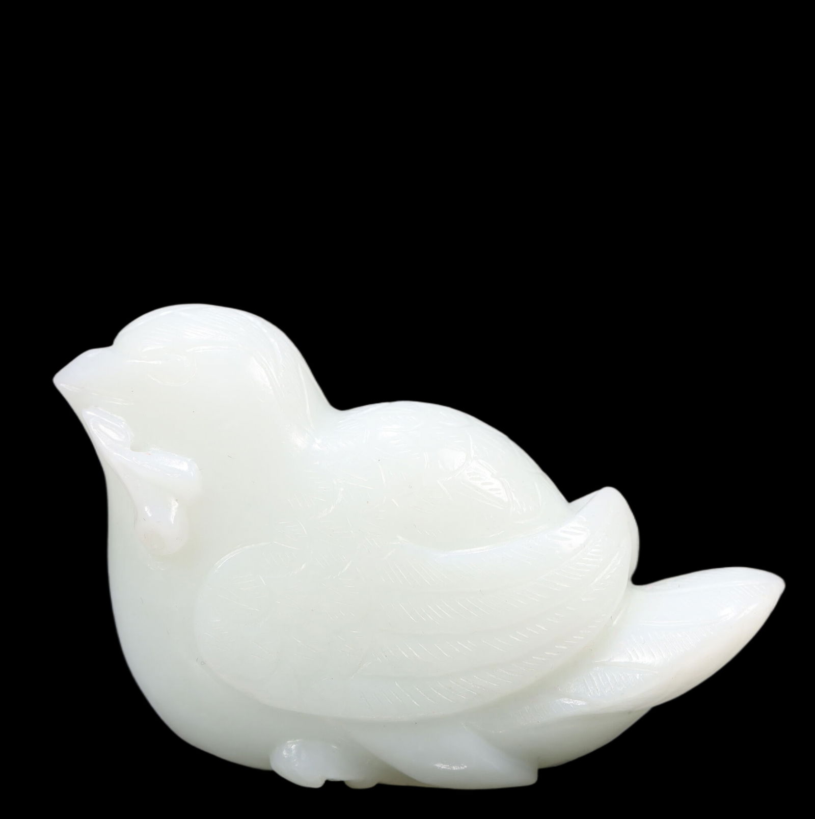 An Exquisite White Jade Bird Ornament: An Exquisite White Jade Bird Ornament, Qing Dynasty, China, Size:2.8inx1inx2in, Weight:128g 精美的白玉 Bird摆件,中国清代, Size:2.8inx1