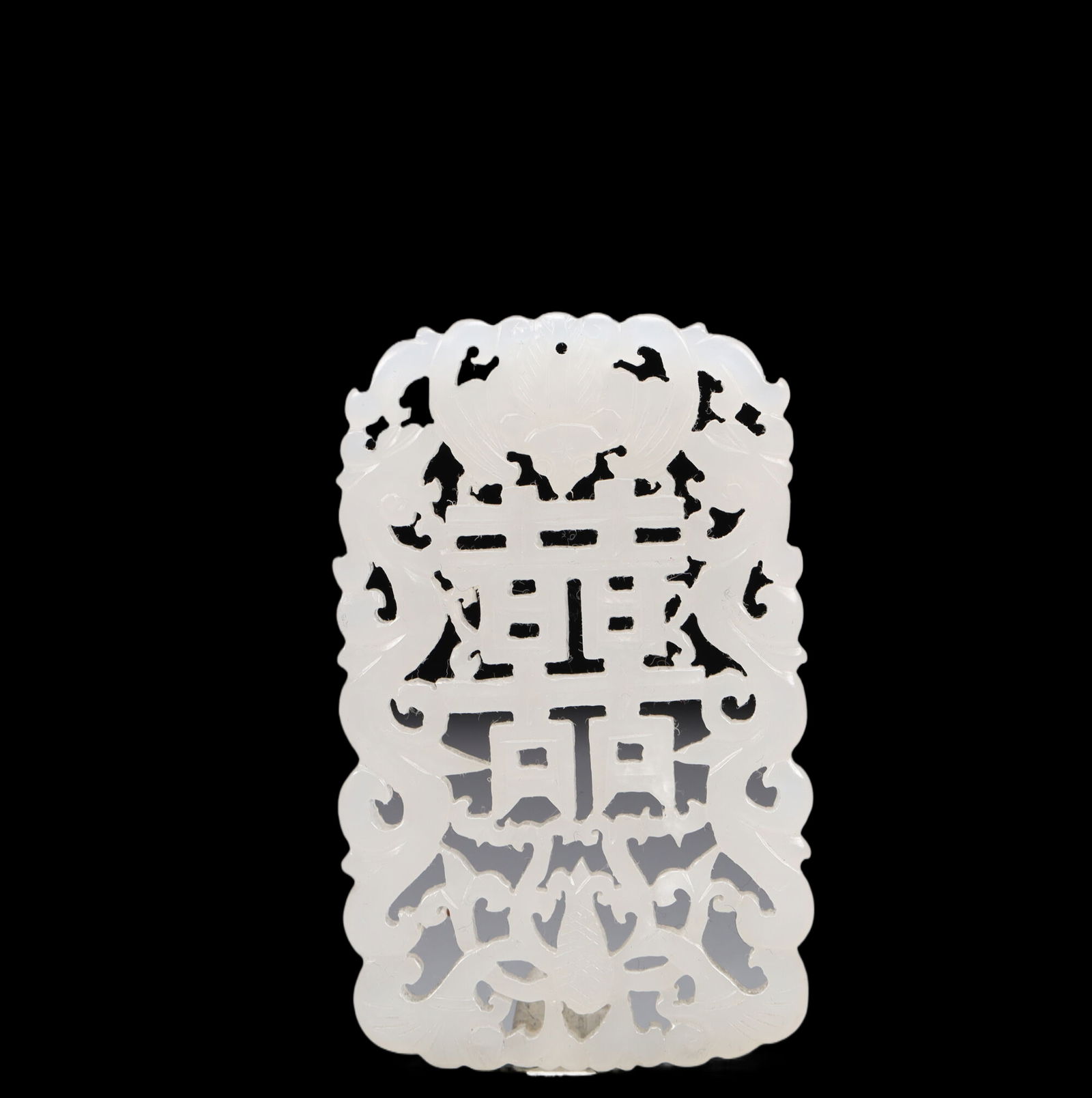 An Exquisite White Jade Double Happiness Pattern Pendant: An Exquisite White Jade Double Happiness Pattern Pendant, Qing Dynasty, China, Size:1.8inx2.8in, Weight:26g 精美的白玉双喜纹挂件,中