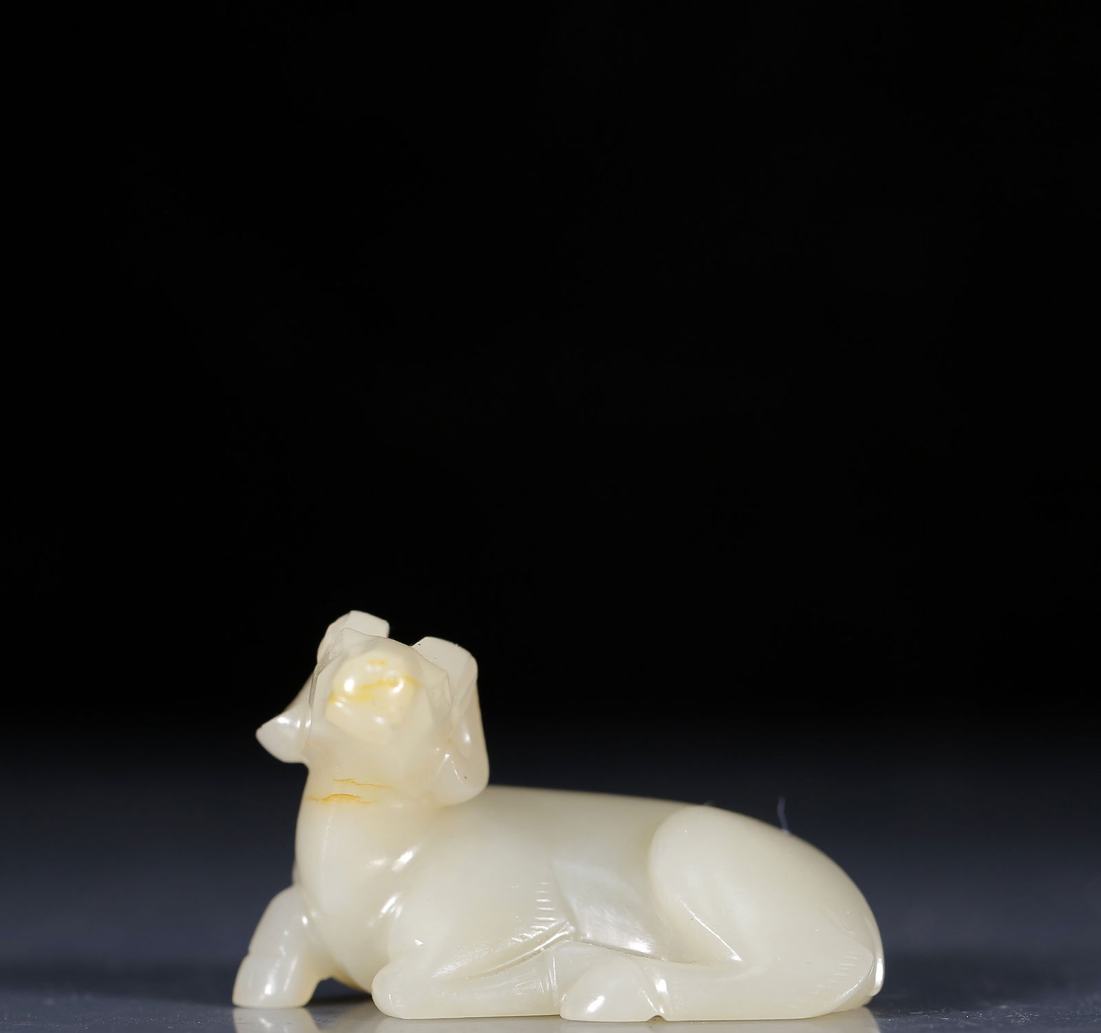 An Exquisite Greenish Jade Sheep Ornament: An Exquisite Greenish Jade Sheep Ornament,Qing Dynasty, China,Size:2inx1.4inx1.4in,Weight:55g 青玉羊摆件，清代