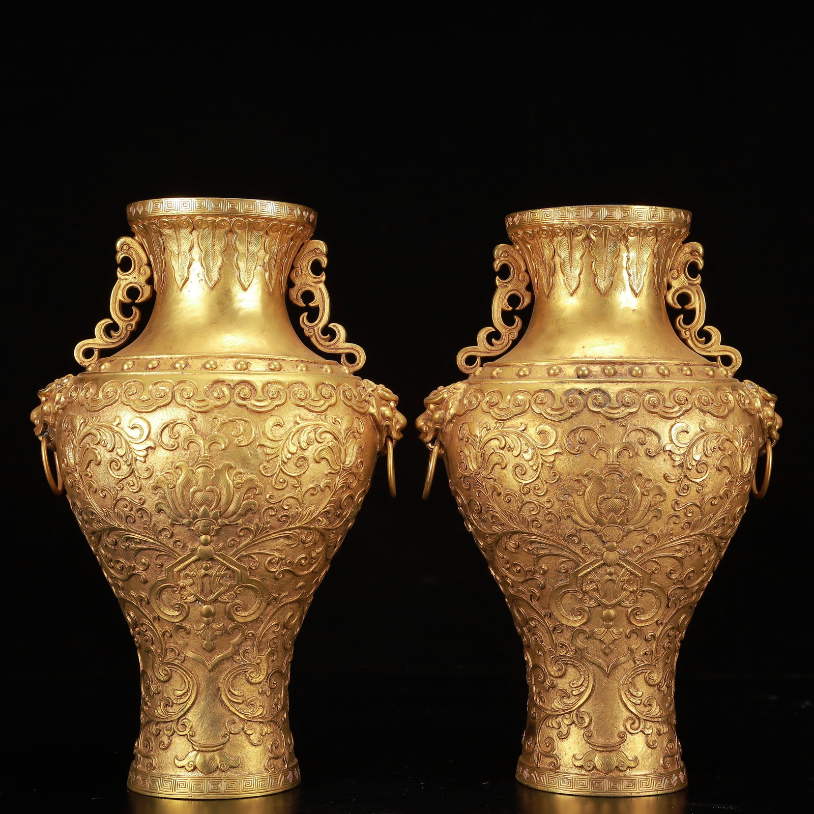 A Pair of Rare Gilt Bronze Lotus Pattern Beast-Ears Vases: A Pair of Rare Gilt Bronze Lotus Pattern Beast-Ears Vases,Qing Dynasty, China,Size:7.1inx4.7inx11.8in,Weight:6550g 一对铜鎏金缠枝莲纹兽ň