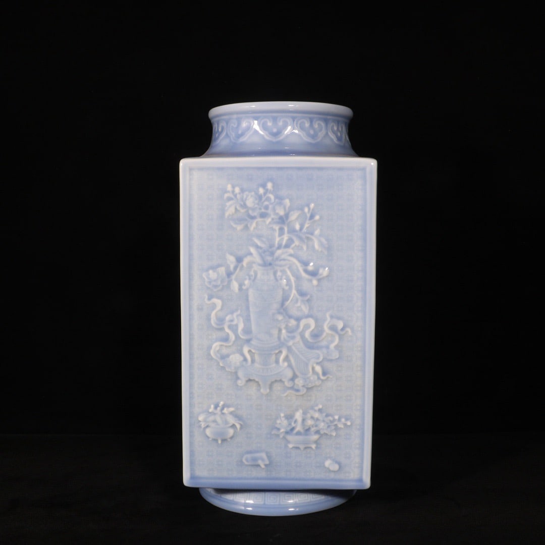 A Rare Sky Blue Glazed Flower Pattern Cong-Shaped Vase: A Rare Sky Blue Glazed Flower Pattern Cong-Shaped Vase,Qing Dynasty, China,Qianlong Six-character Mark,Size:12.6inx5.9in 天蓝釉花卉纹琮式瓶,ߑ
