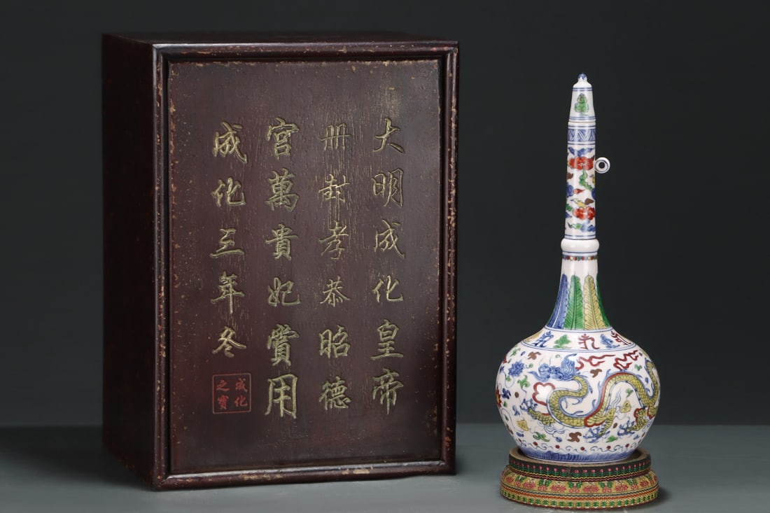 A Rare Doucai Lotus,Auspicious Cloud and Dragon Pattern Bottle,With Sanskrit: A Rare Doucai Lotus,Auspicious Cloud and Dragon Pattern Bottle,With Sanskrit,Ming Dynasty, China,Chenghua Six-character Mark,Size:11.9inx9.1in 斗彩缠枝莲祥云&