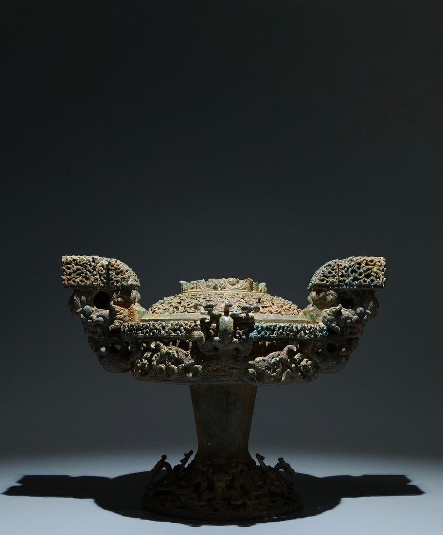 An Archaic Bronze Hollow Chi-Dragon Pattern Beast-Ears Censer,With Inscription: An Archaic Bronze Hollow Chi-Dragon Pattern Beast-Ears Censer,With Inscription,the Warring States period in China,Size:10inx13inx11in 青铜镂空螭龙纹兽&#