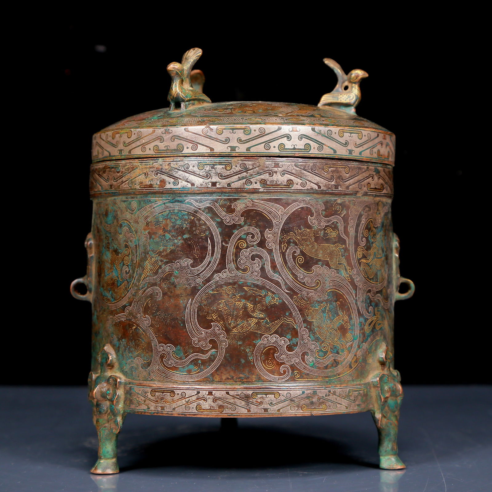 A Rare Bronze Inlaid Gold and Silver Dragon and Phoenix Pattern Tripod Jar: A Rare Bronze Inlaid Gold and Silver Dragon and Phoenix Pattern Tripod Jar,Ancient Time, China,Size:5.9inx7.5in,Weight:2720g 铜错金银龙凤纹三足