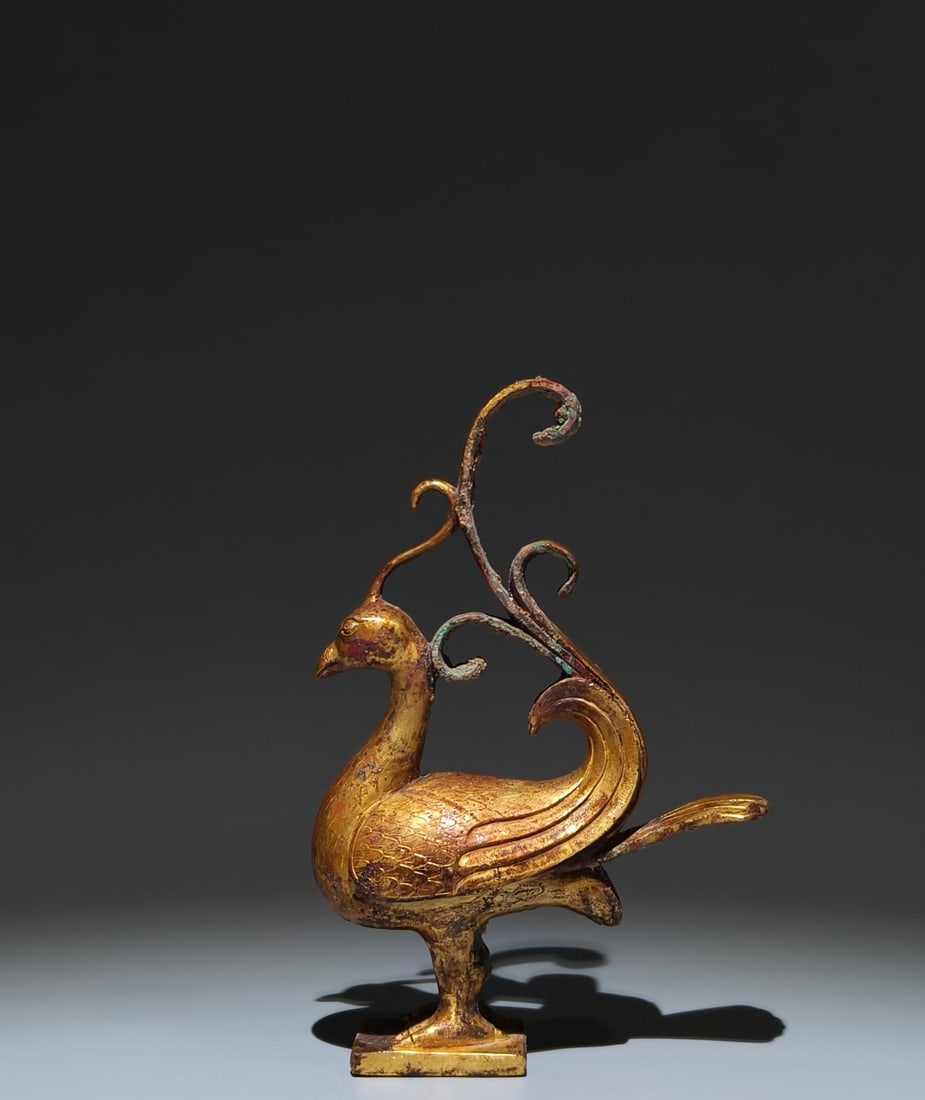 An Exquisite Gilt Bronze Phoenix Ornament: An Exquisite Gilt Bronze Phoenix Ornament,Han Dynasty, China,Size:8.1inx5.3inx2in 铜鎏金凤摆件,中国汉代