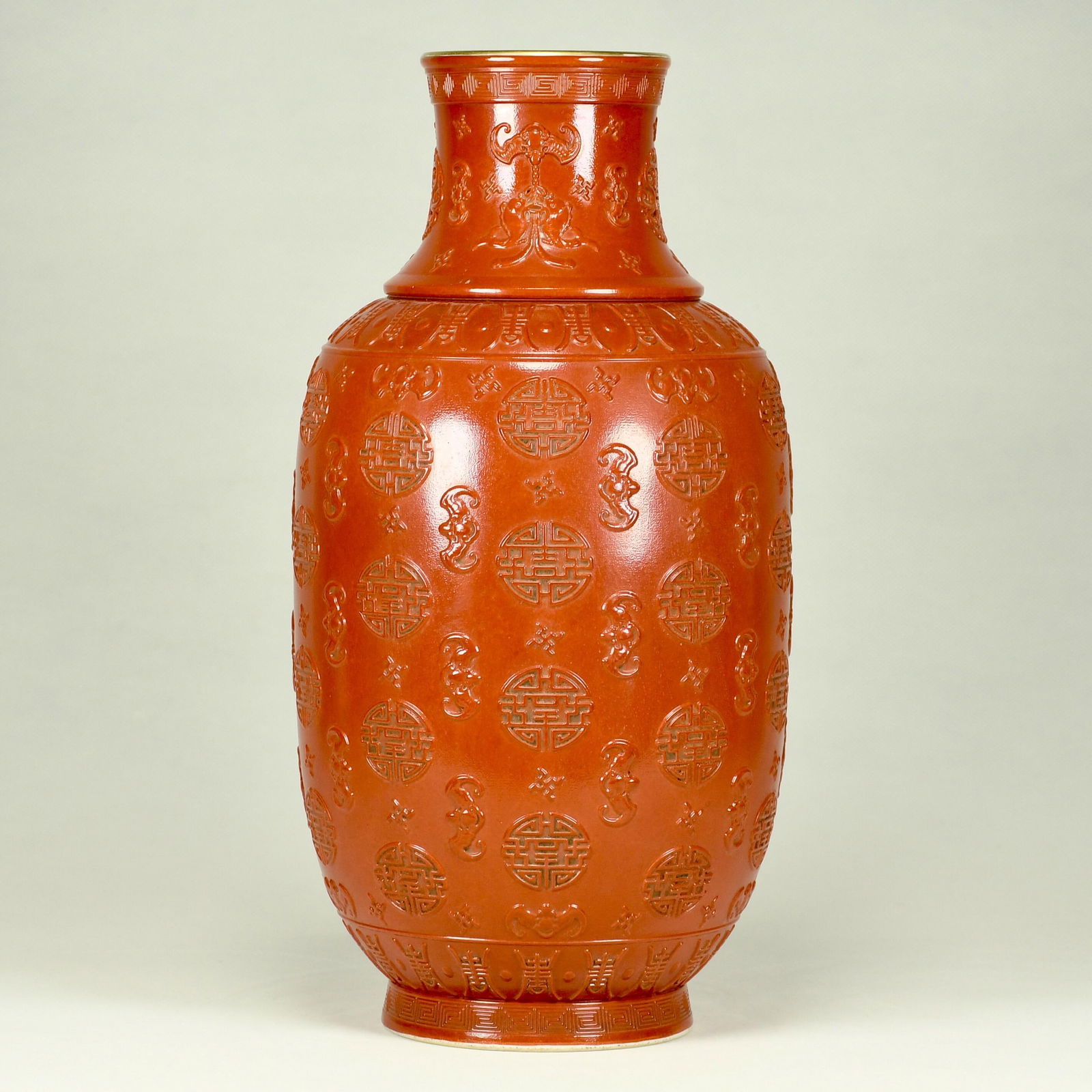 A Rare Iron-Red Glazed Painted Gold Bats and Peach Pattern Vase: A Rare Iron-Red Glazed Painted Gold Bats and Peach Pattern Vase,Qing Dynasty, China,Qianlong Six-character Mark,Size:13.8inx7.9in 矾红釉描金福寿纹ல