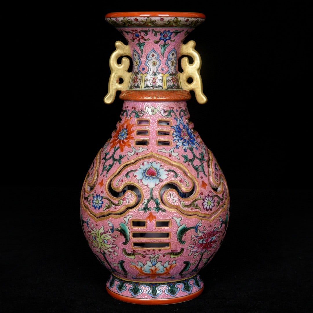 An Exquisite Pink Ground Enamel Painted Gold Hollow Lotus Pattern Double-Ears Vase: An Exquisite Pink Ground Enamel Painted Gold Hollow Lotus Pattern Double-Ears Vase,Qing Dynasty, China,Qianlong Six-character Mark,Size:7.9inx4.3in 粉地珐琅彩描%
