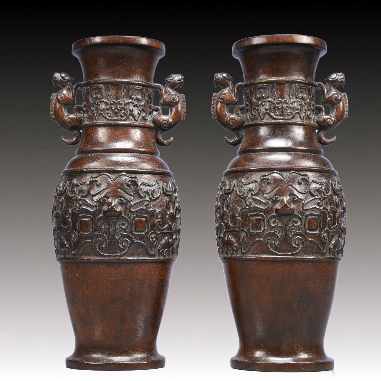 A Pair of Exquisite Eaglewood Beast-Face Pattern Dragon-Ears Vases: A Pair of Exquisite Eaglewood Beast-Face Pattern Dragon-Ears Vases,Qing Dynasty, China,Size:5.1inx2.6inx11.6in,Weight:550g 一对沉香木兽面纹龙ň